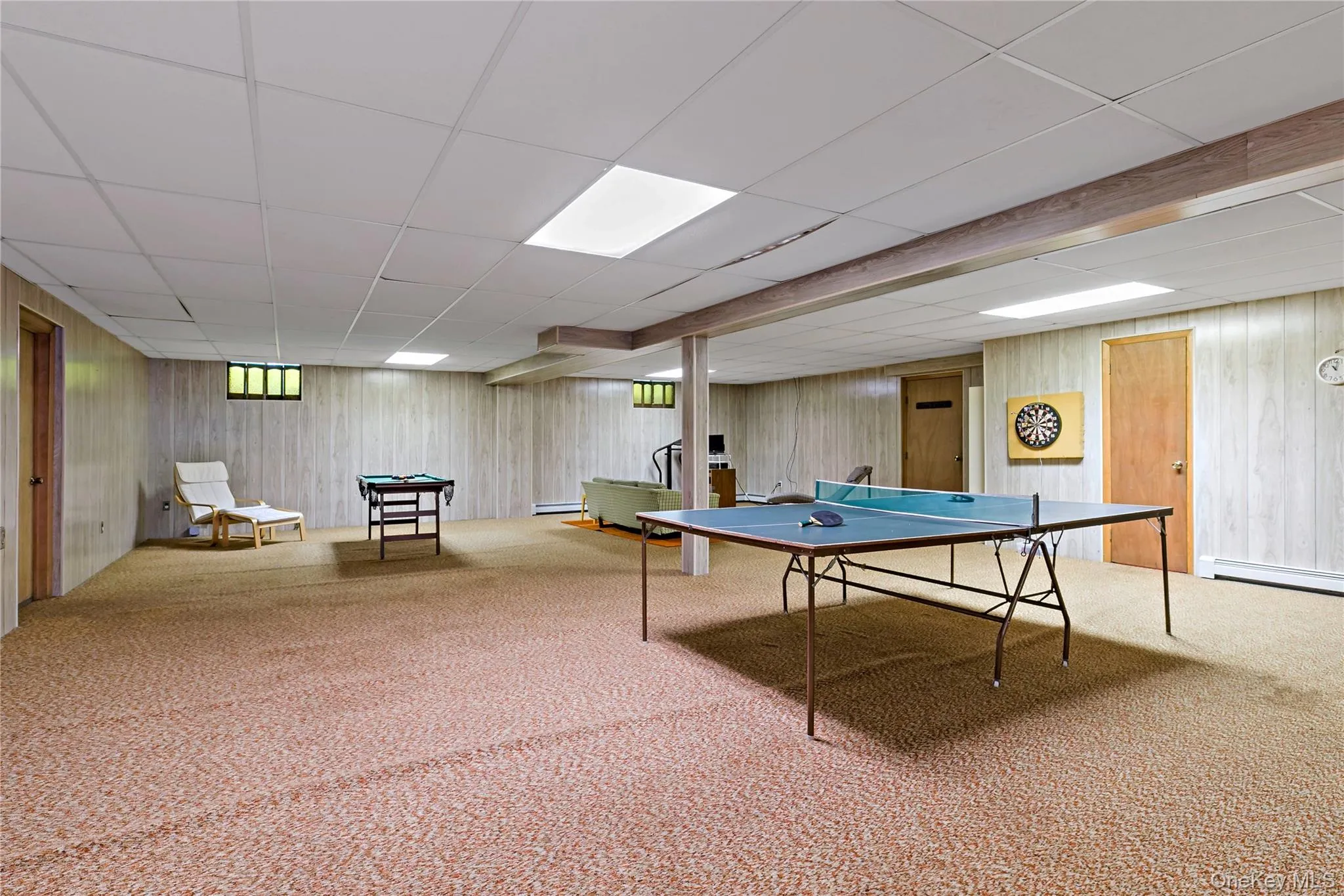 Ping pong, pool table, darts, video games, exercise, and wood burning stove...all in one room. Ping pong, pool table, darts, video games, exercise, and wood burning stove...all in one room.