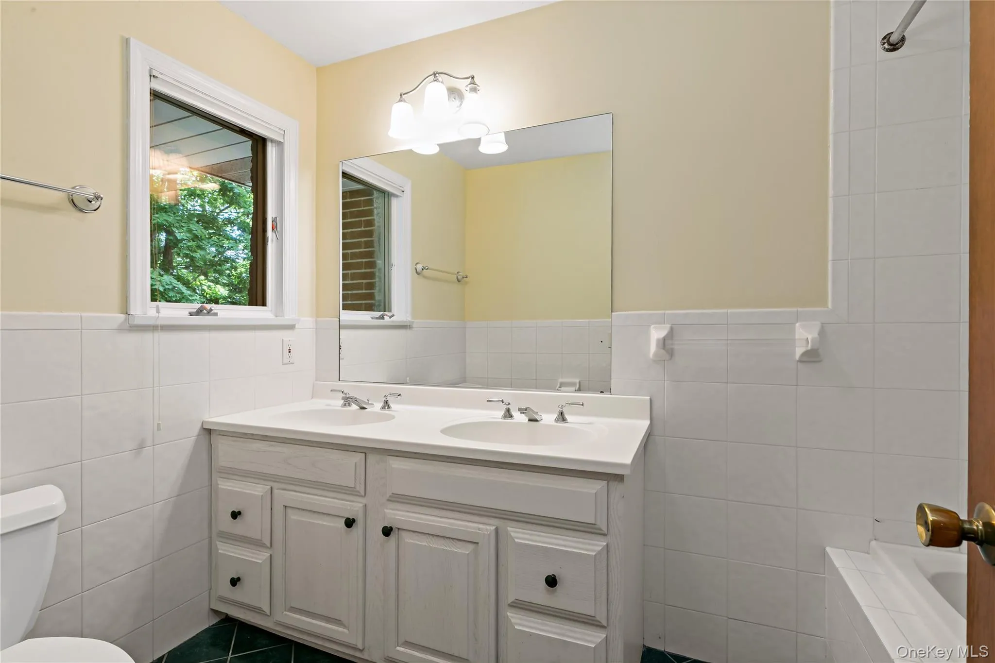 Hall bath servicing bedrooms two through four. Hall bath servicing bedrooms two through four.
