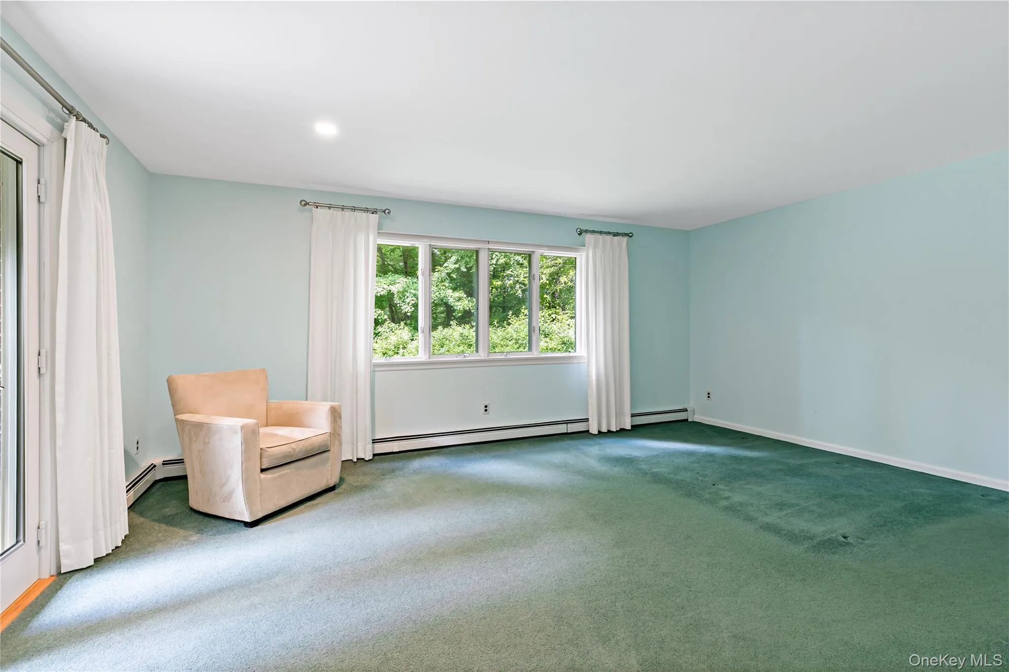 Private primary bedroom with its own French doors to terrace. Private primary bedroom with its own French doors to terrace.