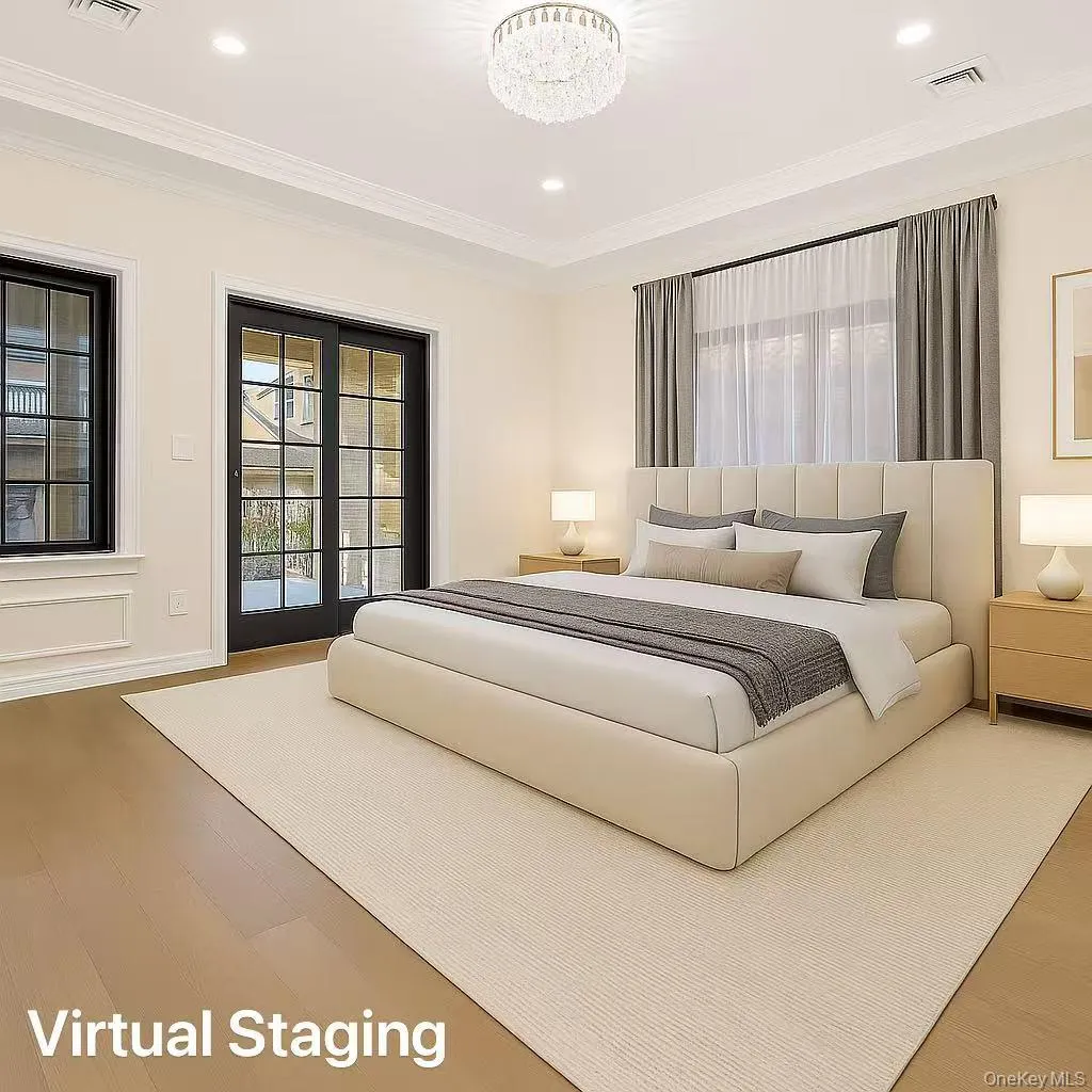 Bedroom with access to outside, wood finished floors, crown molding, and recessed lighting Bedroom with access to outside, wood finished floors, crown molding, and recessed lighting