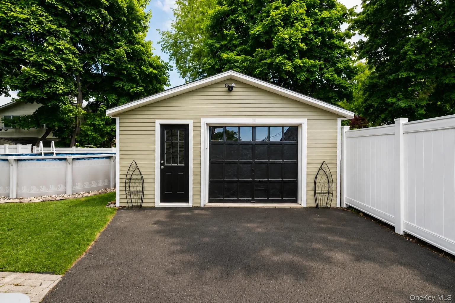 Detached garage with private driveway Detached garage with private driveway