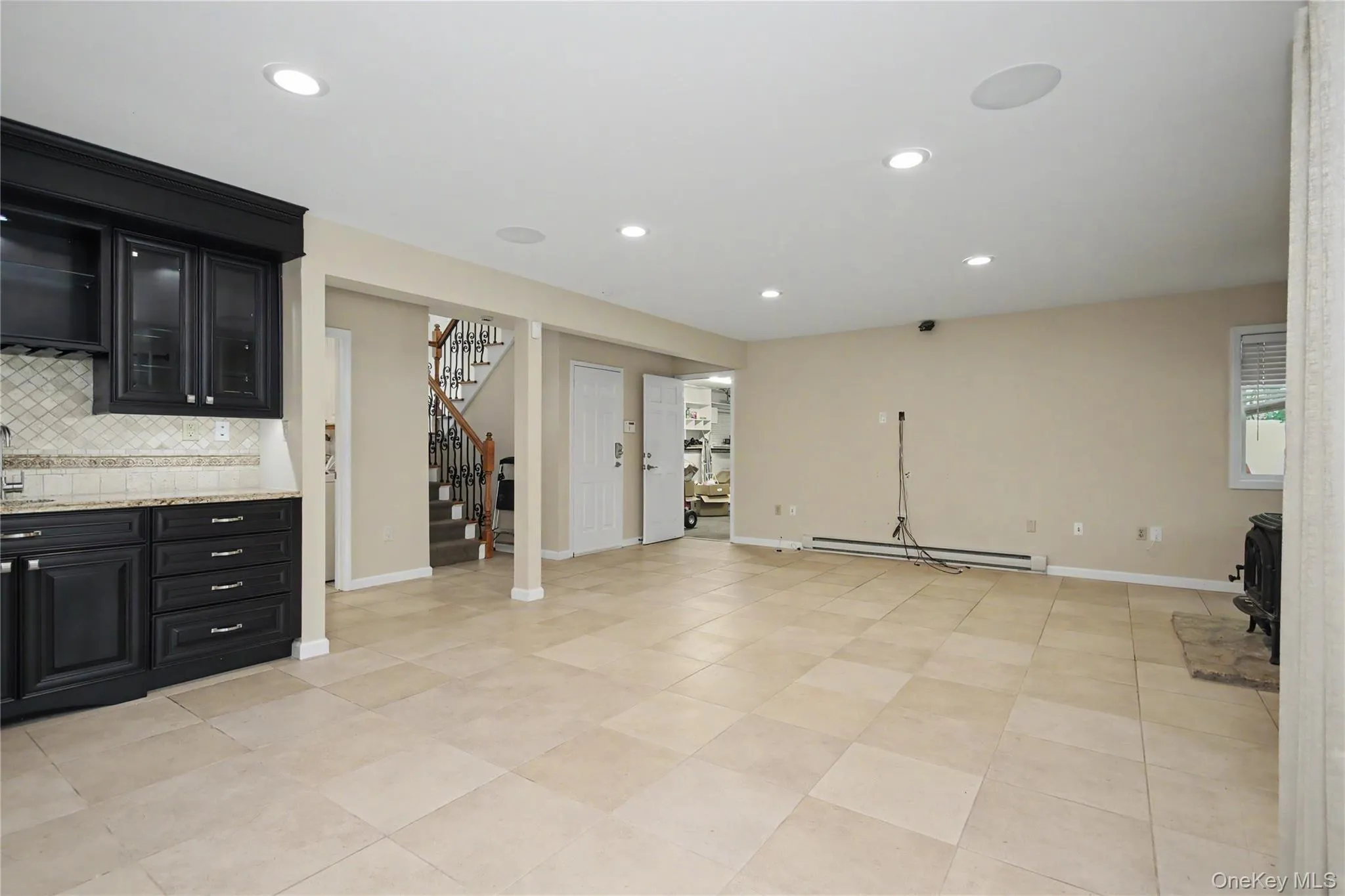 Family room with Cabinetry, sink and recessed lighting Family room with Cabinetry, sink and recessed lighting