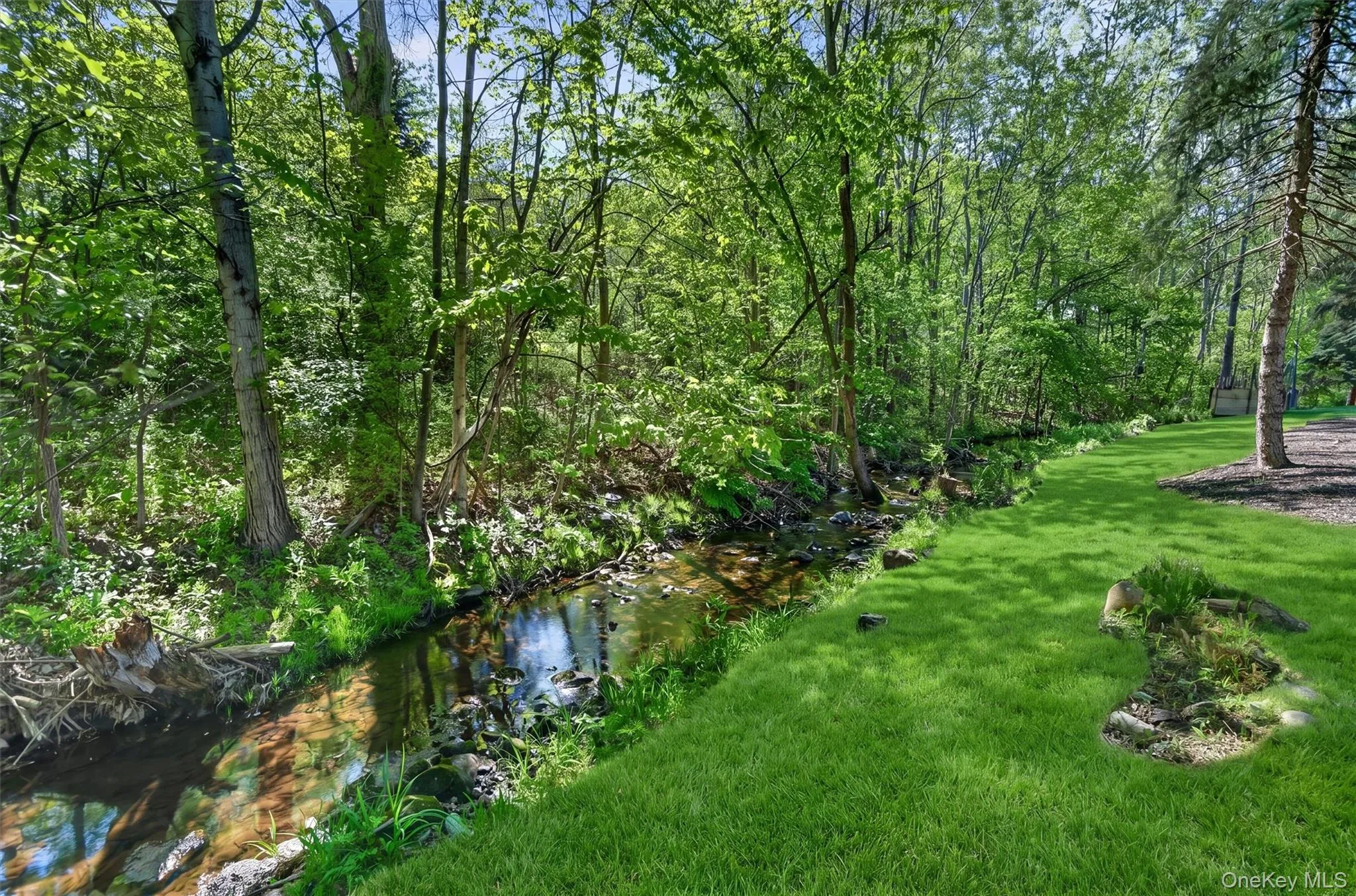 Relax on your deck under the awning and listen the the sound of the stream. Relax on your deck under the awning and listen the the sound of the stream.