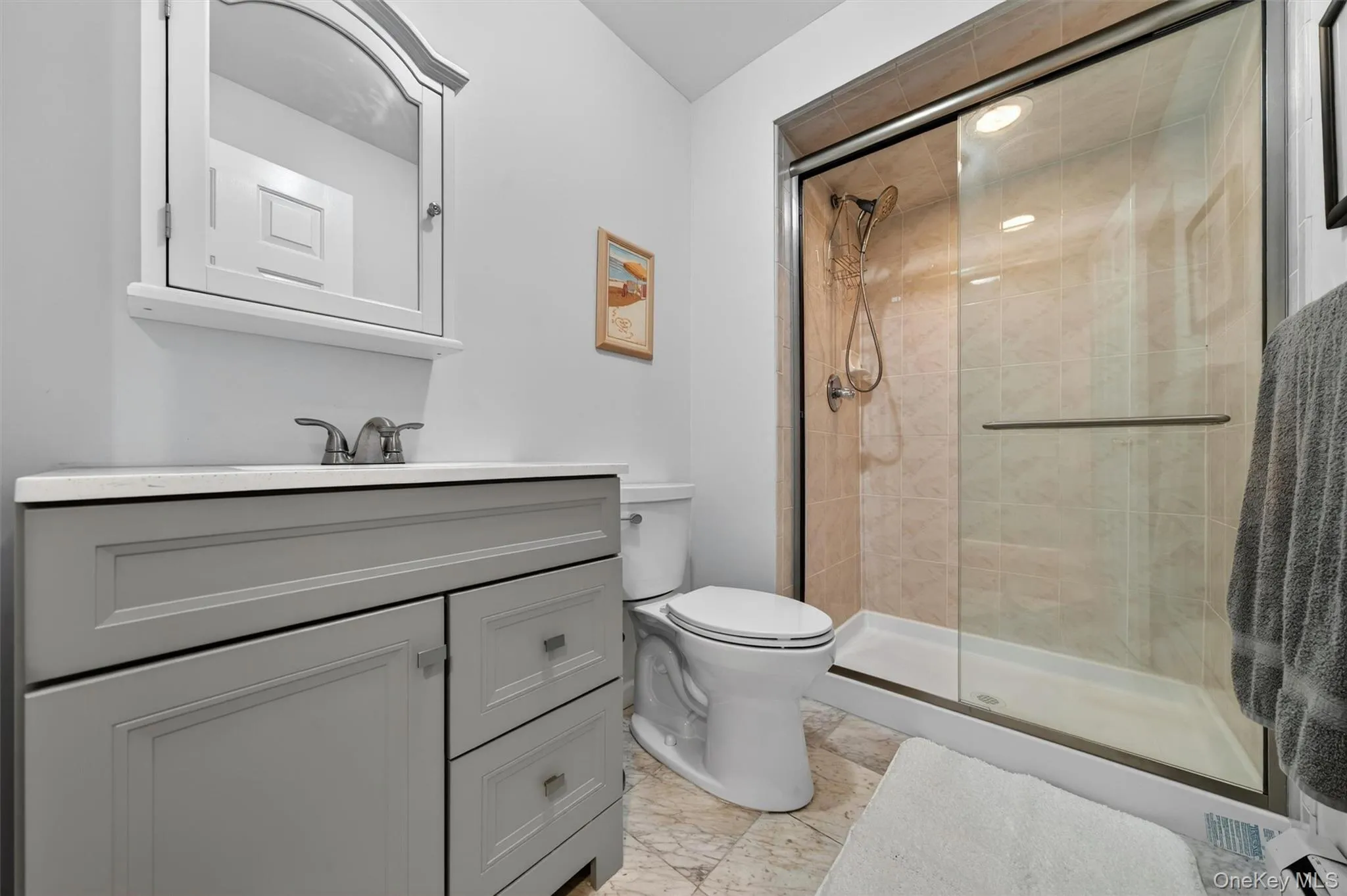 The third full bathroom was recently updated and offers a walk in shower. The third full bathroom was recently updated and offers a walk in shower.