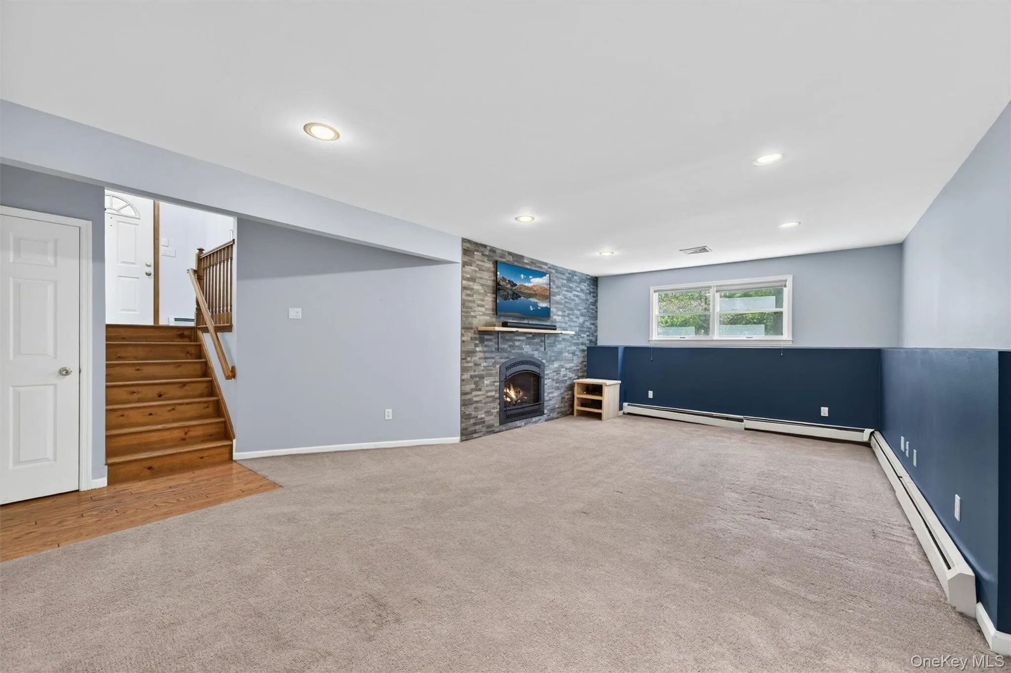 The lower level has a large family room leading out to the patio. The lower level has a large family room leading out to the patio.