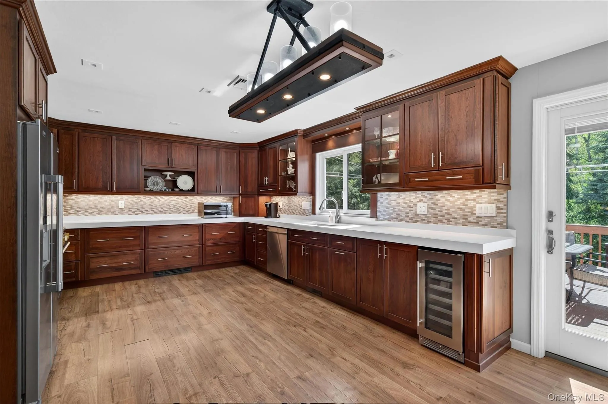 All appliances stay including the wine refrigerator. All appliances stay including the wine refrigerator.