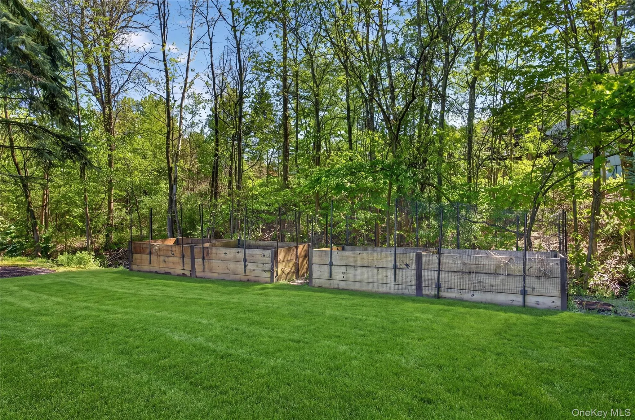 The protected garden beds have an underground sprinkler system. The protected garden beds have an underground sprinkler system.