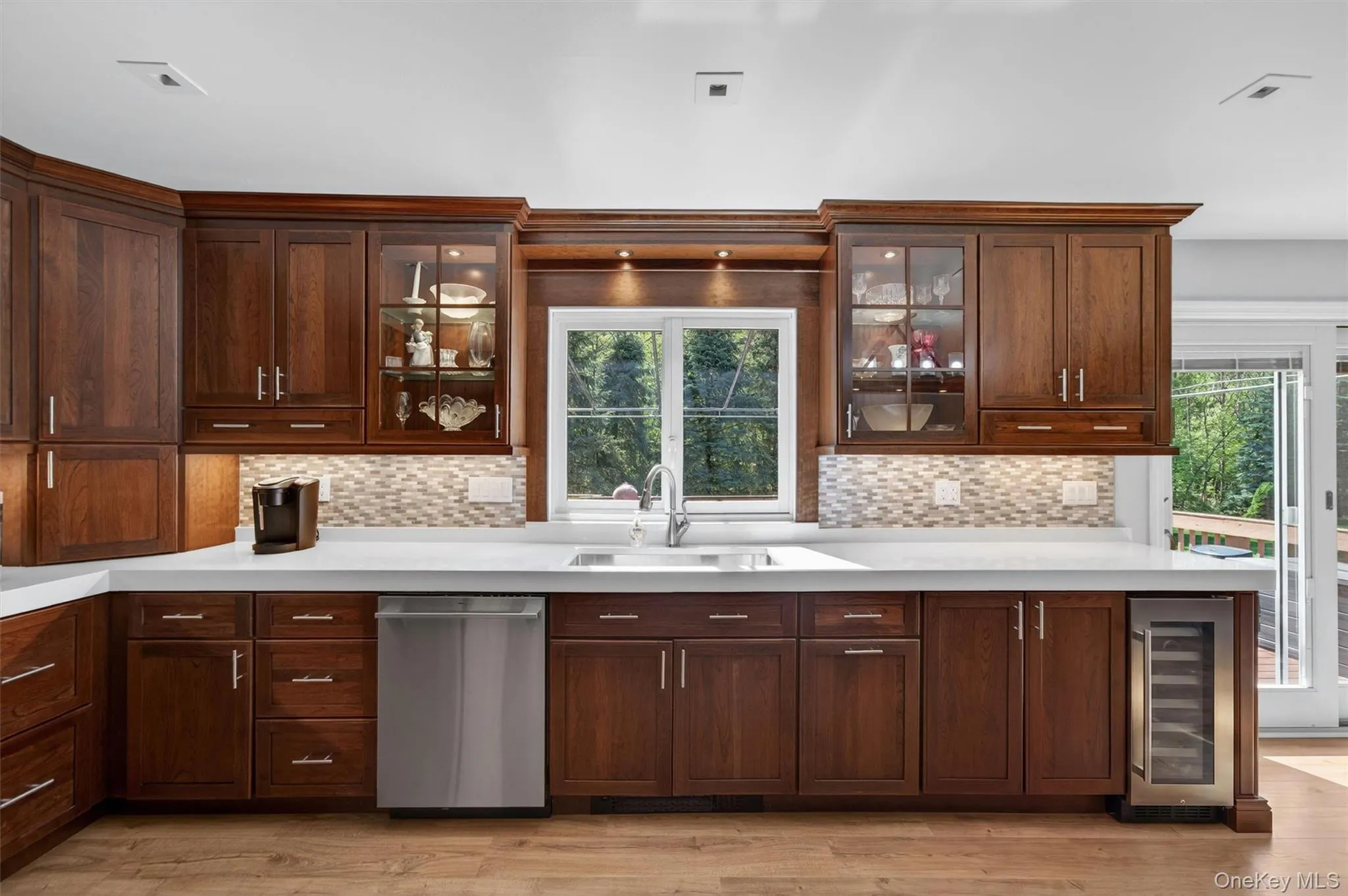 The window was designed as a pass through for easy outdoor entertaining. The window was designed as a pass through for easy outdoor entertaining.