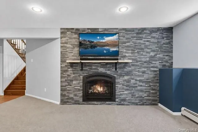 Here is the second fireplace which creates a cozy casual space. Here is the second fireplace which creates a cozy casual space.