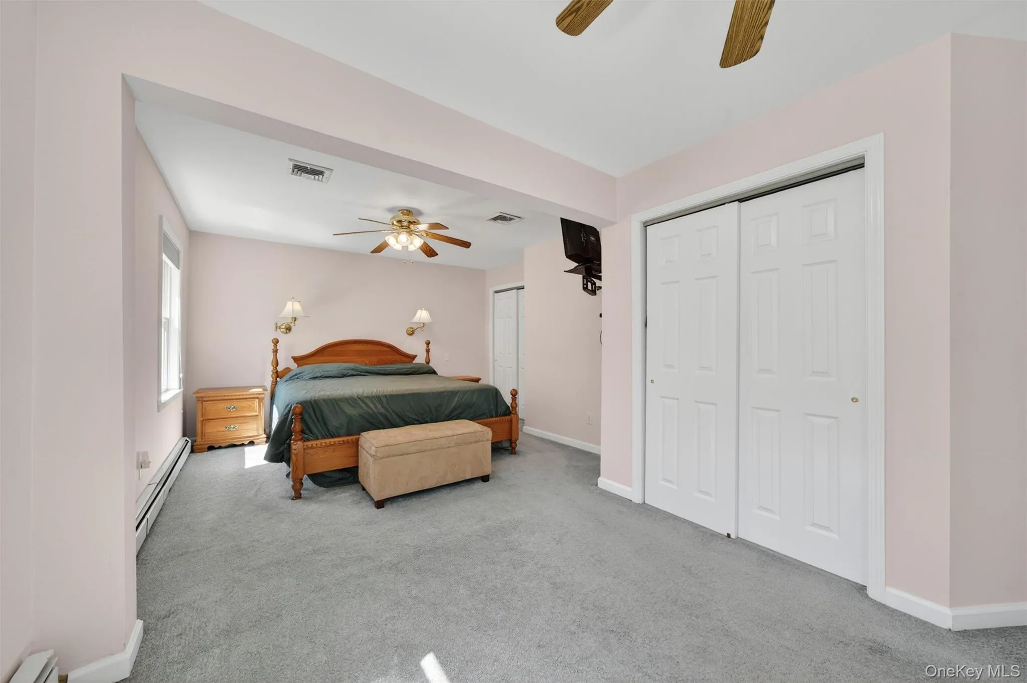 This oversized room has two double door closets. This oversized room has two double door closets.