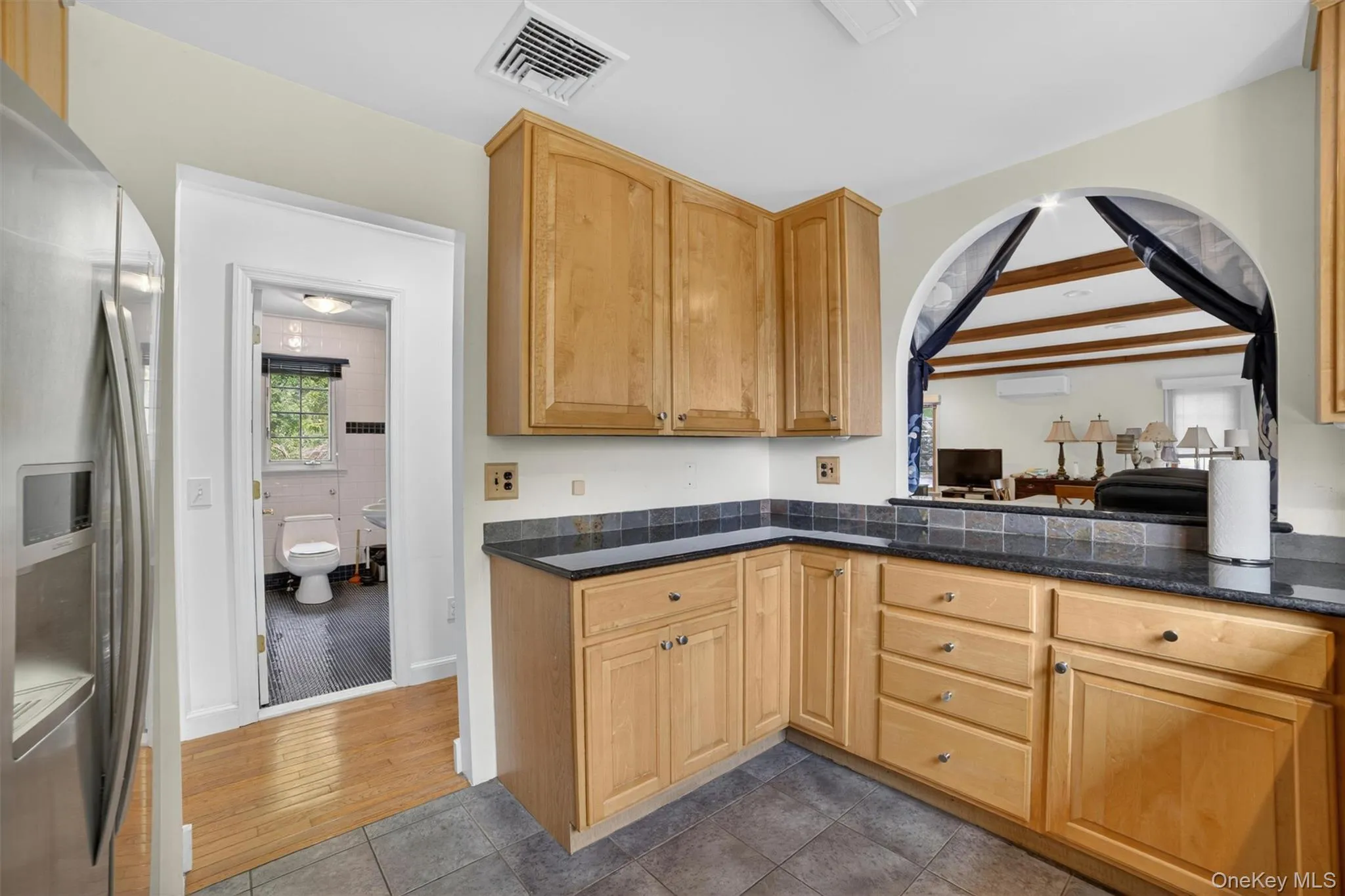 Perfect for entertaining, the kitchen connects effortlessly to the dining area and outdoor deck overlooking seasonal Hudson River views. Perfect for entertaining, the kitchen connects effortlessly to the dining area and outdoor deck overlooking seasonal Hudson River views.