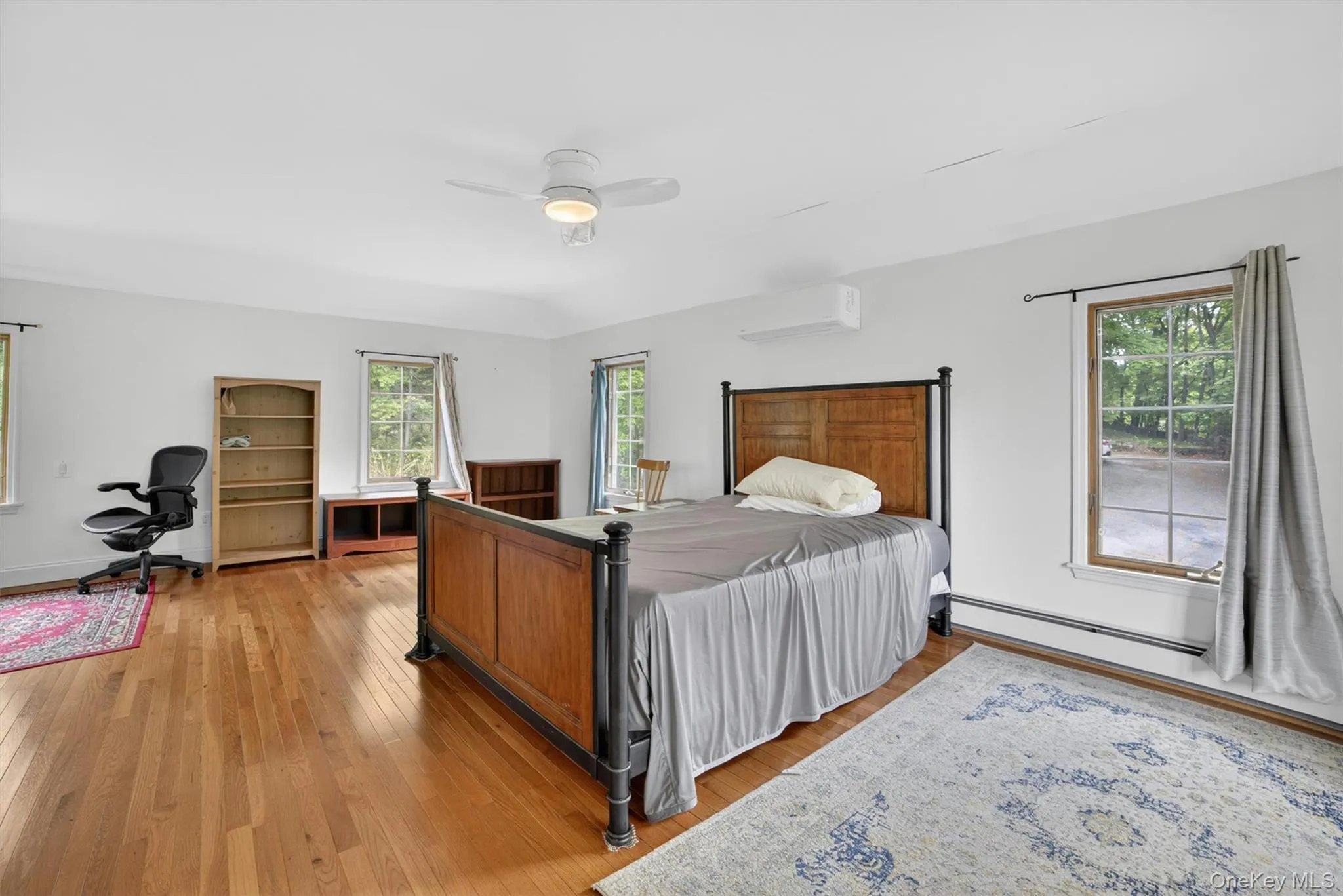 Natural light and scenic river views make this upstairs bedroom a relaxing retreat. Natural light and scenic river views make this upstairs bedroom a relaxing retreat.