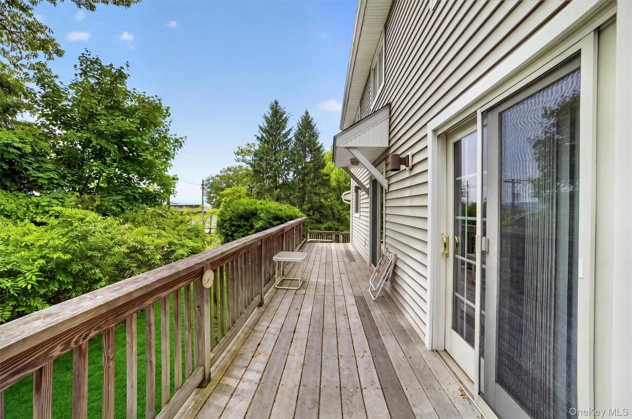 The multi-level outdoor deck creates an ideal setting for morning coffee, outdoor dining, and peaceful river sunsets. The multi-level outdoor deck creates an ideal setting for morning coffee, outdoor dining, and peaceful river sunsets.