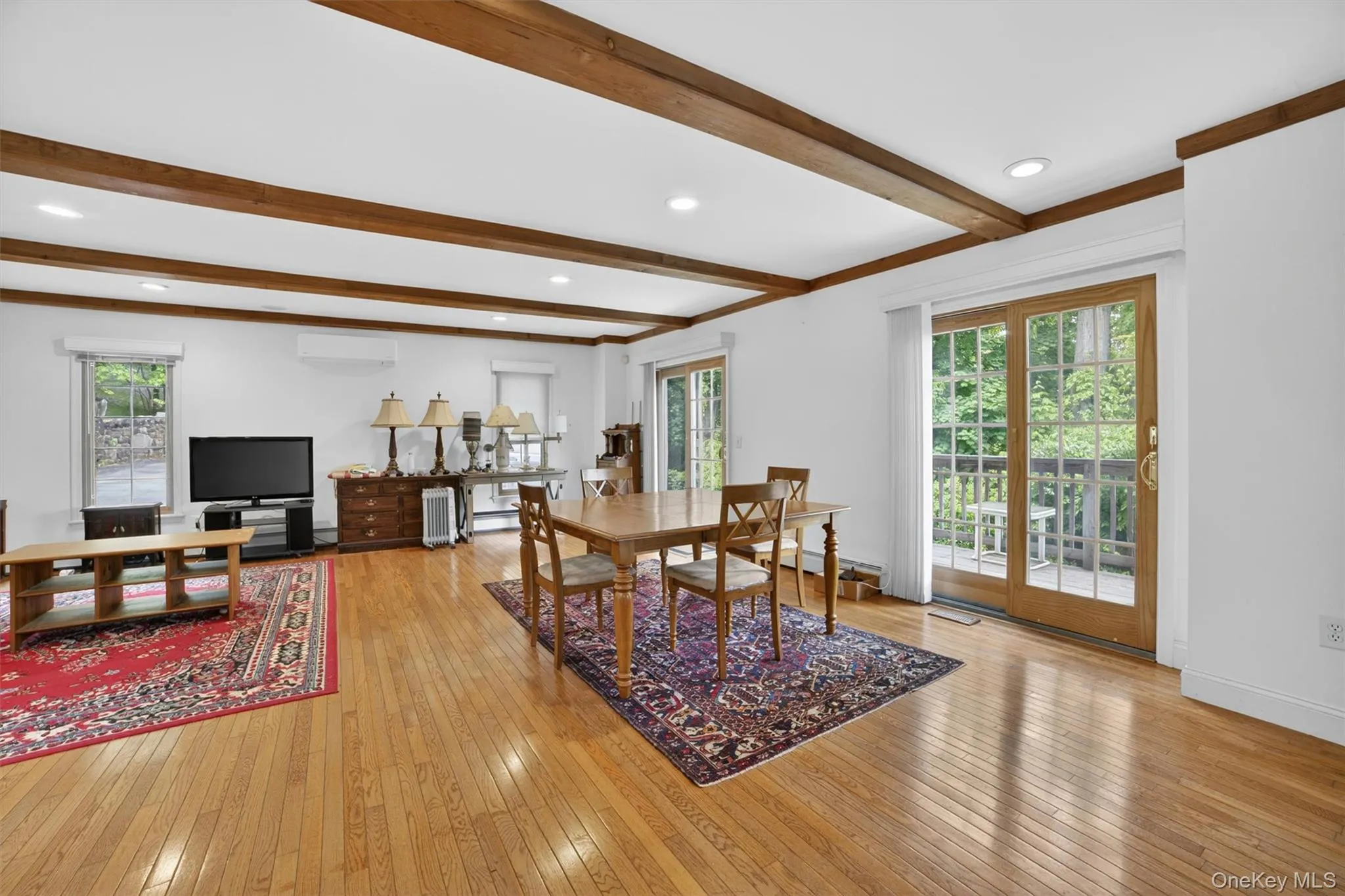 Open-concept living and dining area offering a comfortable and flexible layout ideal for both everyday living and entertaining. Open-concept living and dining area offering a comfortable and flexible layout ideal for both everyday living and entertaining.