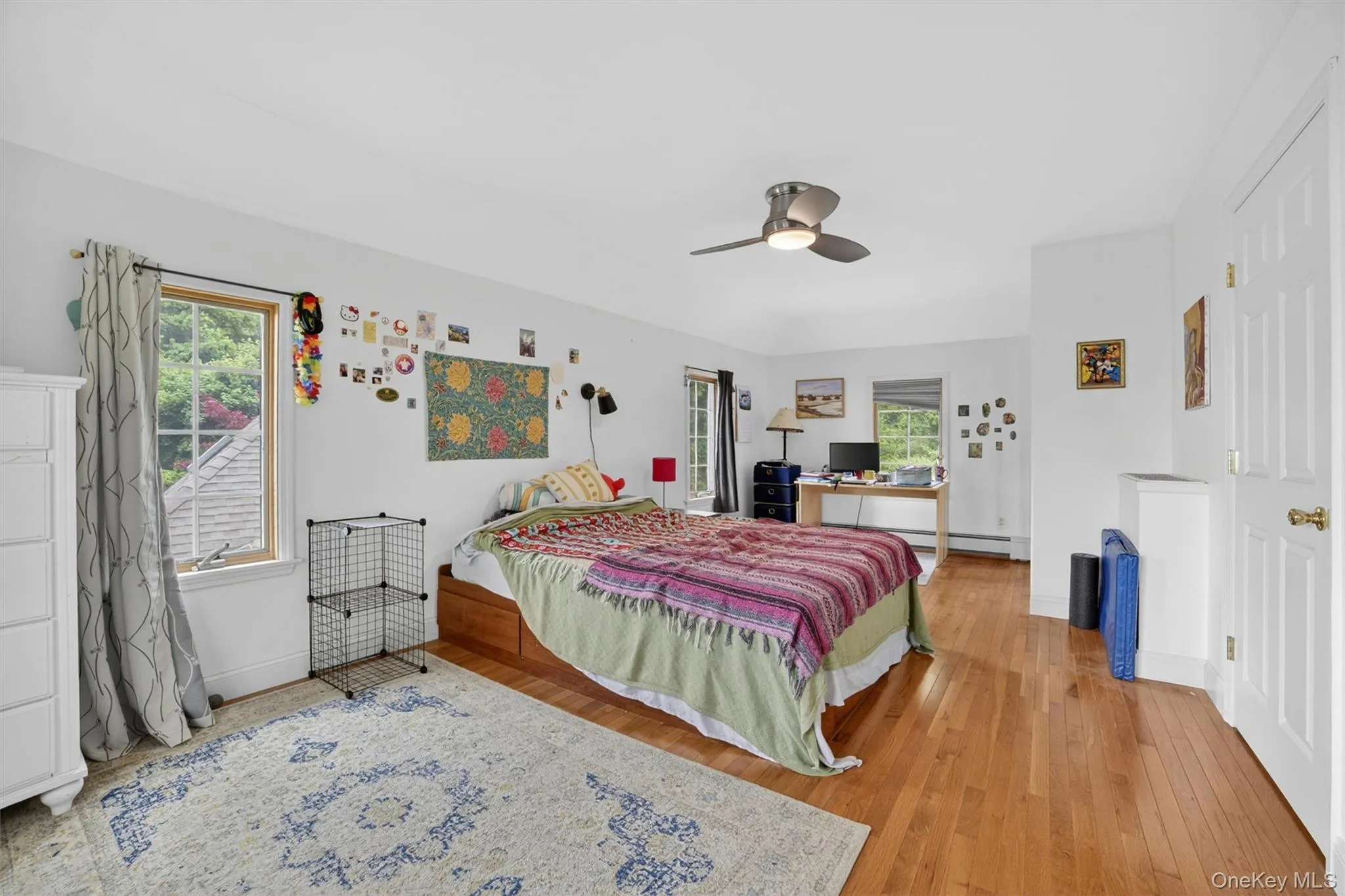 Upstairs bedroom featuring a comfortable layout and a peaceful setting. Upstairs bedroom featuring a comfortable layout and a peaceful setting.