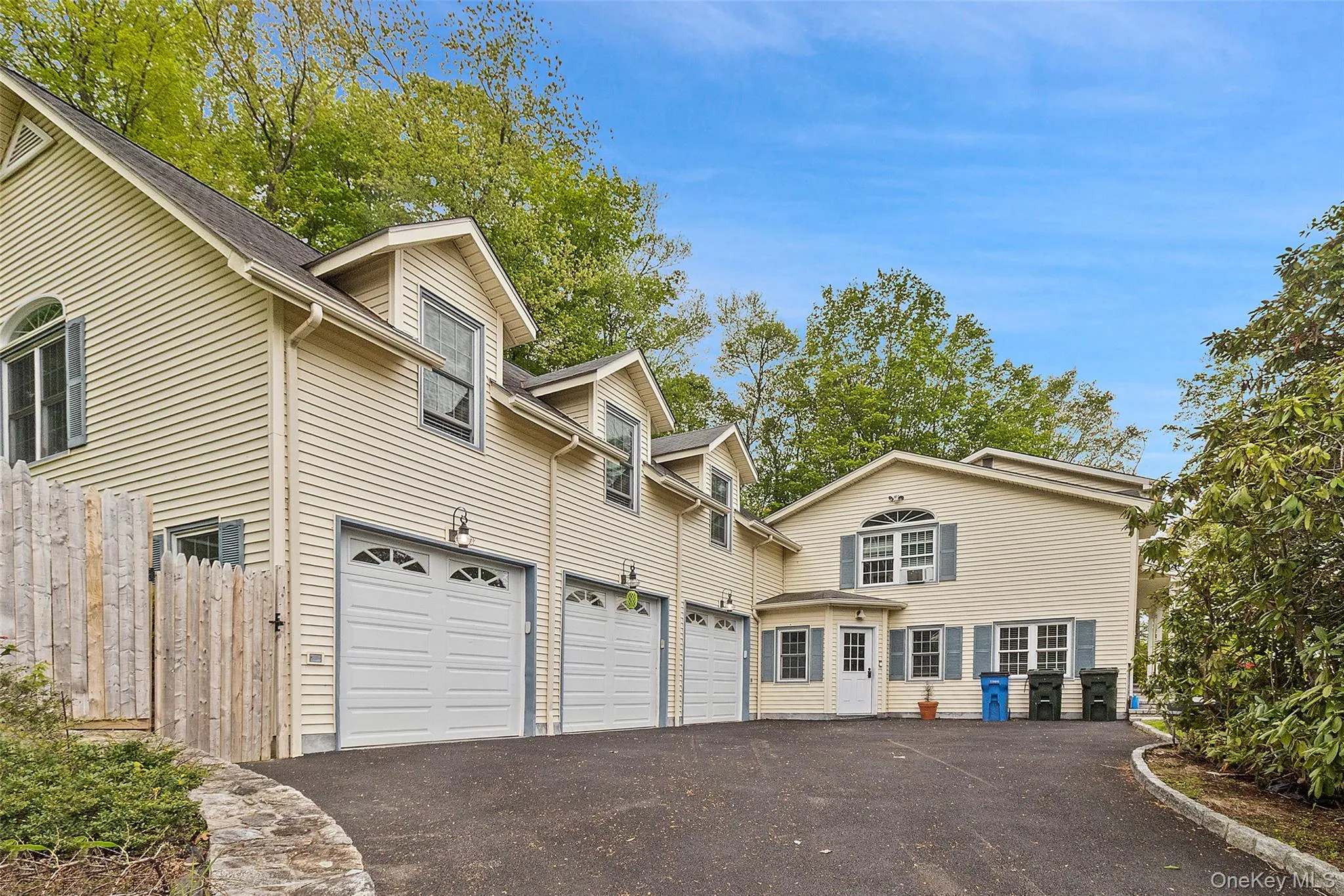 Driveway featuring 3 car garage Driveway featuring 3 car garage