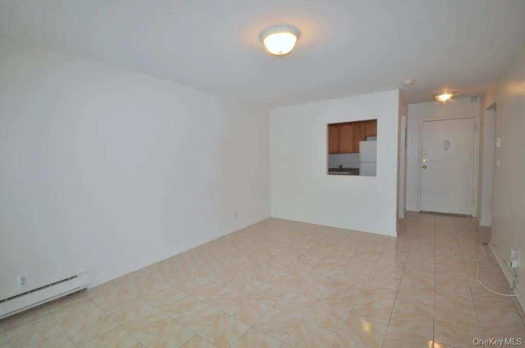 Living room has sliding glass doors to a private balcony. Living room has sliding glass doors to a private balcony.