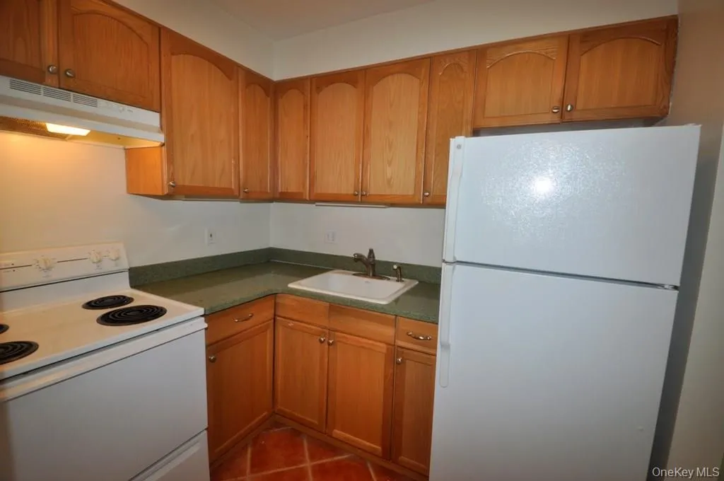 New Kitchen has a pass thru to the living room. New Kitchen has a pass thru to the living room.