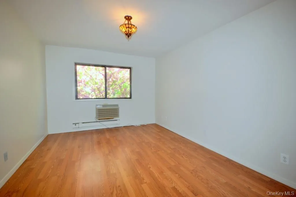 Large Bedroom has hardwood floors. Large Bedroom has hardwood floors.