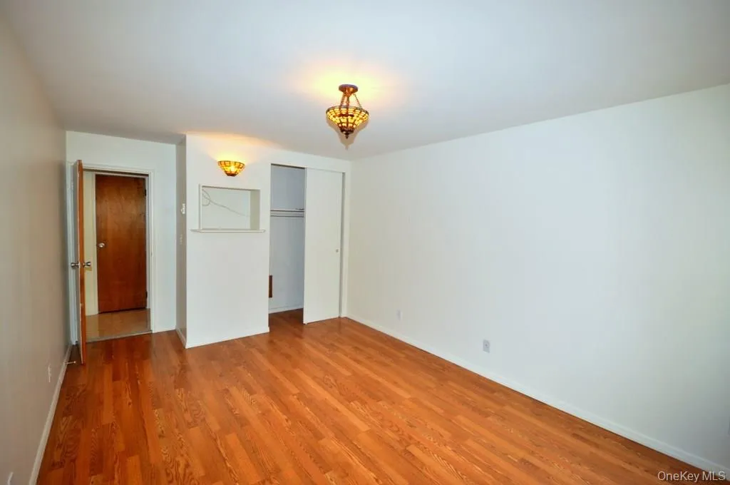 Large Bedroom has hardwood floors. Large Bedroom has hardwood floors.