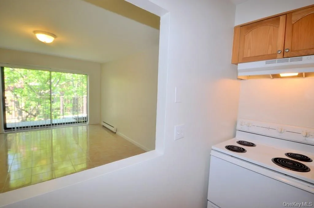 New Kitchen has a pass thru to the living room. New Kitchen has a pass thru to the living room.