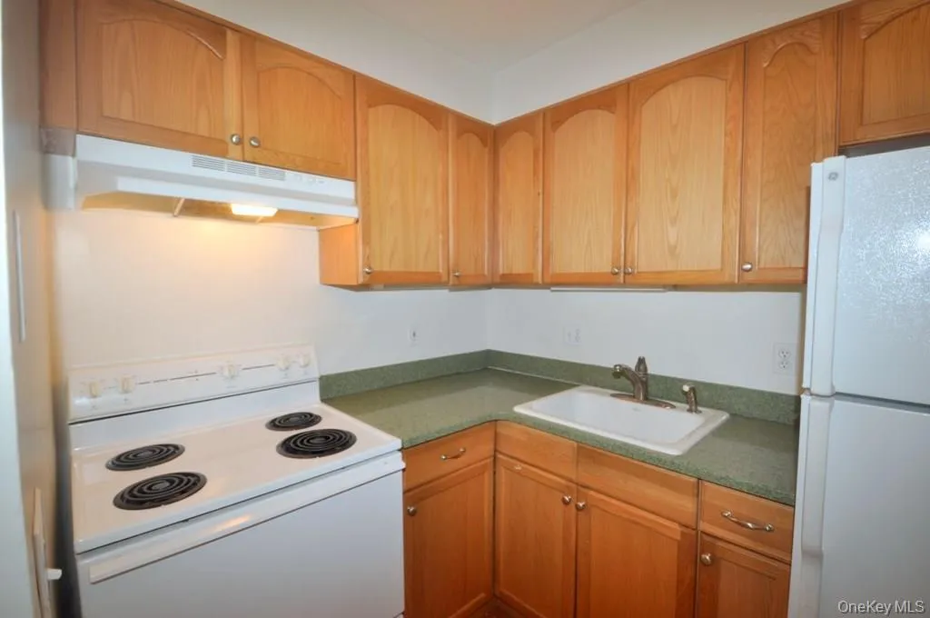 New Kitchen has a pass thru to the living room. New Kitchen has a pass thru to the living room.