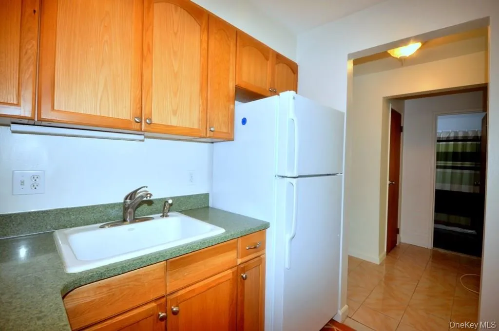 New Kitchen has a pass thru to the living room. New Kitchen has a pass thru to the living room.