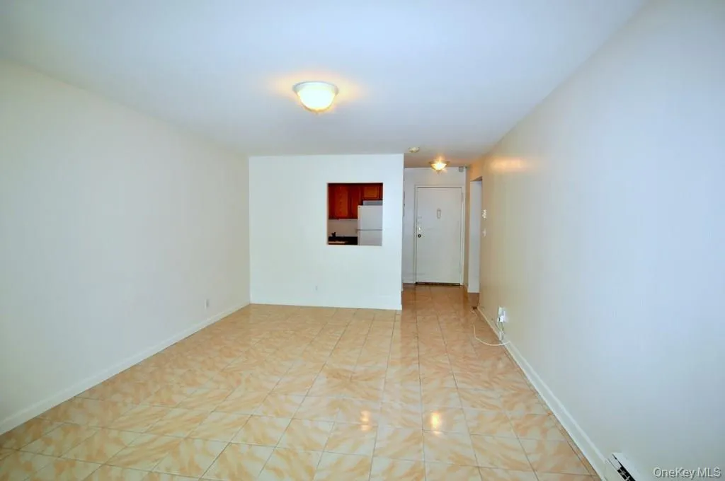 Living room has sliding glass doors to a private balcony. Living room has sliding glass doors to a private balcony.