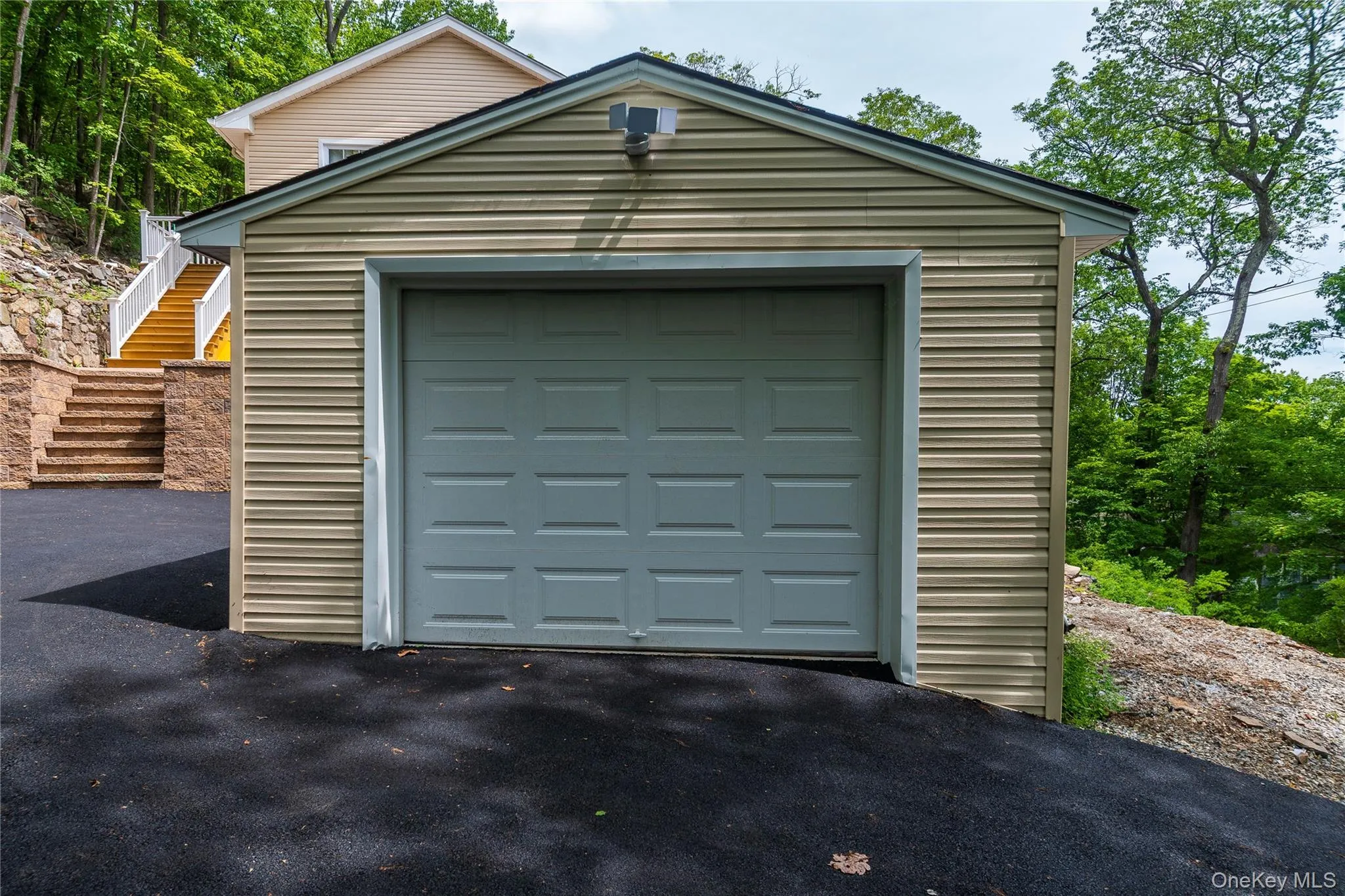 Detached garage with driveway Detached garage with driveway