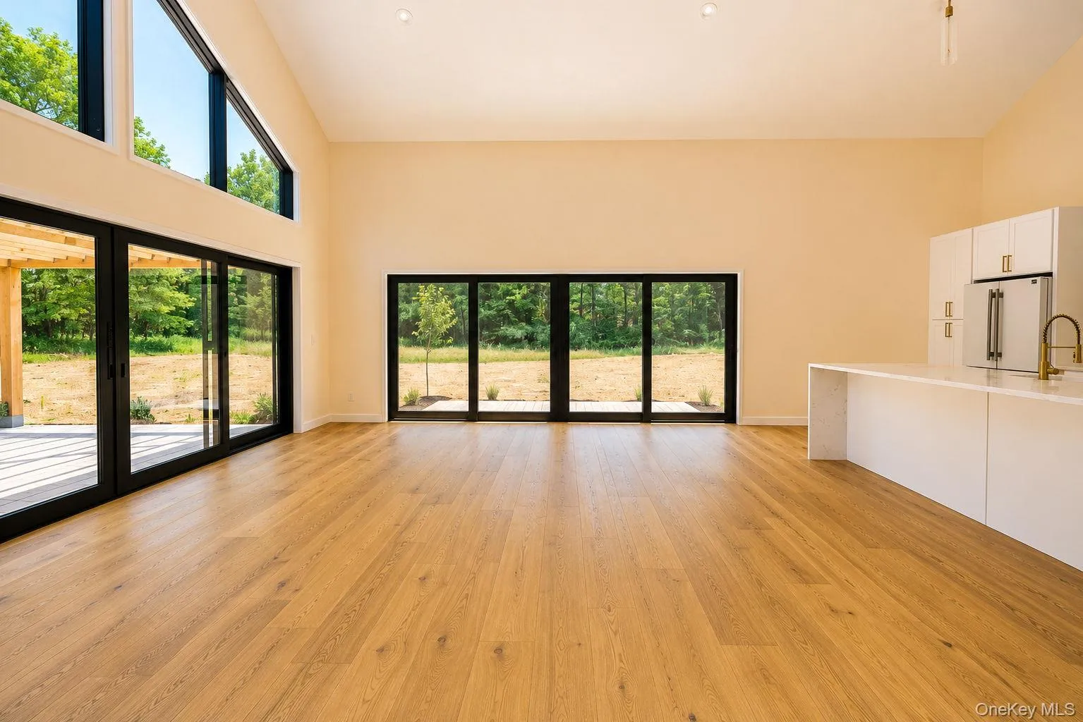 Dining area with oversize sliding doors to outside patio Dining area with oversize sliding doors to outside patio