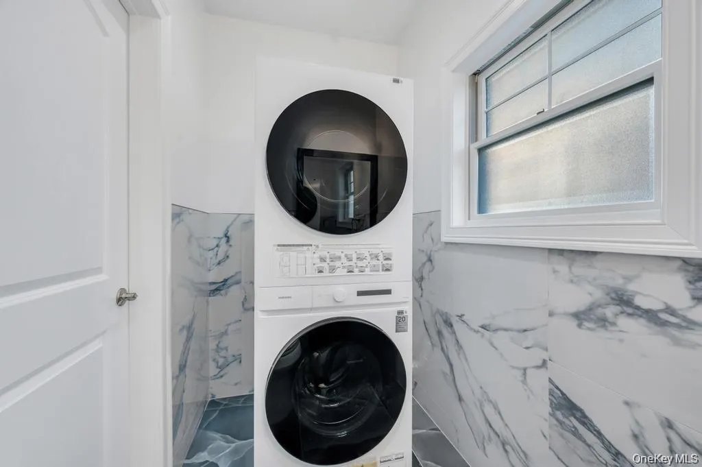 1st Floor Half Bathroom w/Laundry. 1st Floor Half Bathroom w/Laundry.
