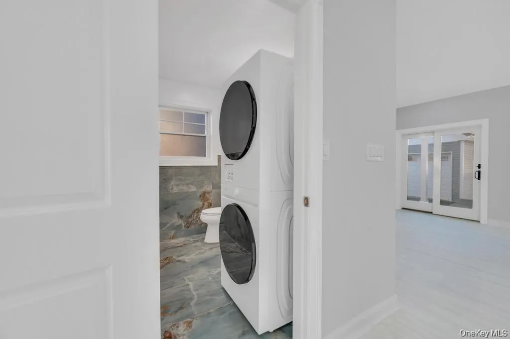 1st Floor Half Bathroom w/Laundry 1st Floor Half Bathroom w/Laundry