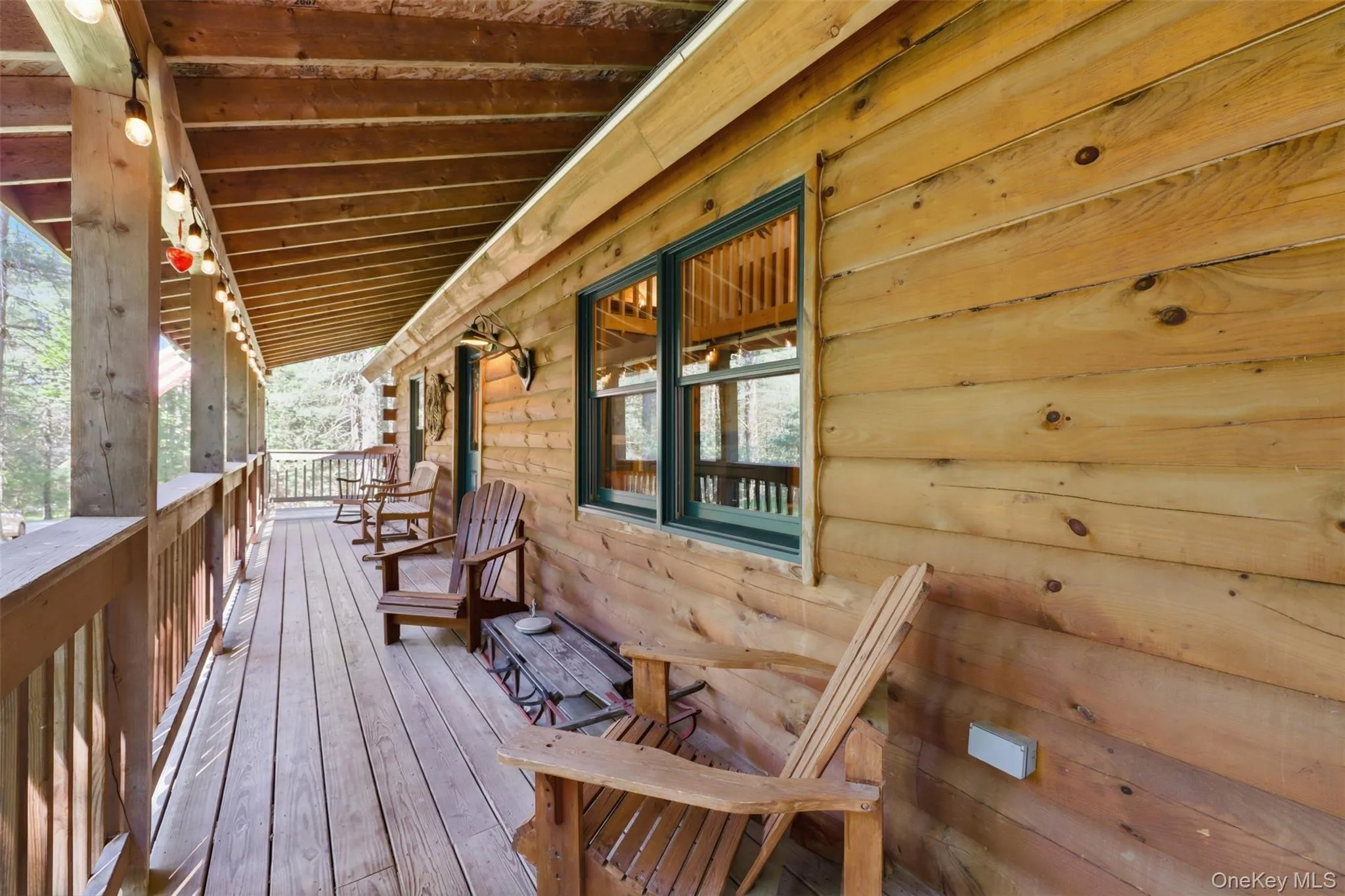 Large covered wrap around deck Large covered wrap around deck