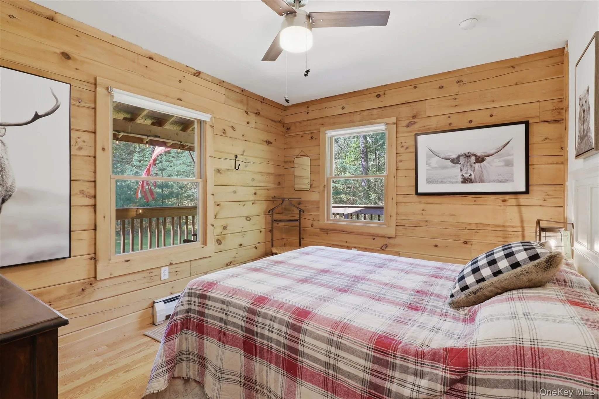 The wildlife room, decorated with handsome animal prints, fitting the a cabin in the woods. This home gives all the right vibes. The wildlife room, decorated with handsome animal prints, fitting the a cabin in the woods. This home gives all the right vibes.