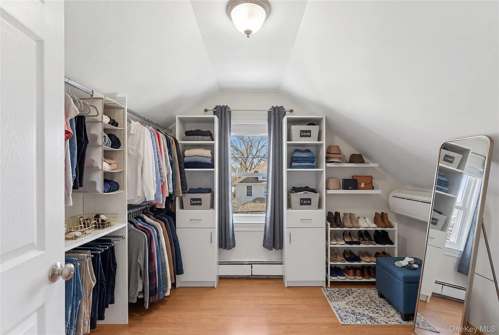 Customizable closet system with wood-finish flooring Customizable closet system with wood-finish flooring