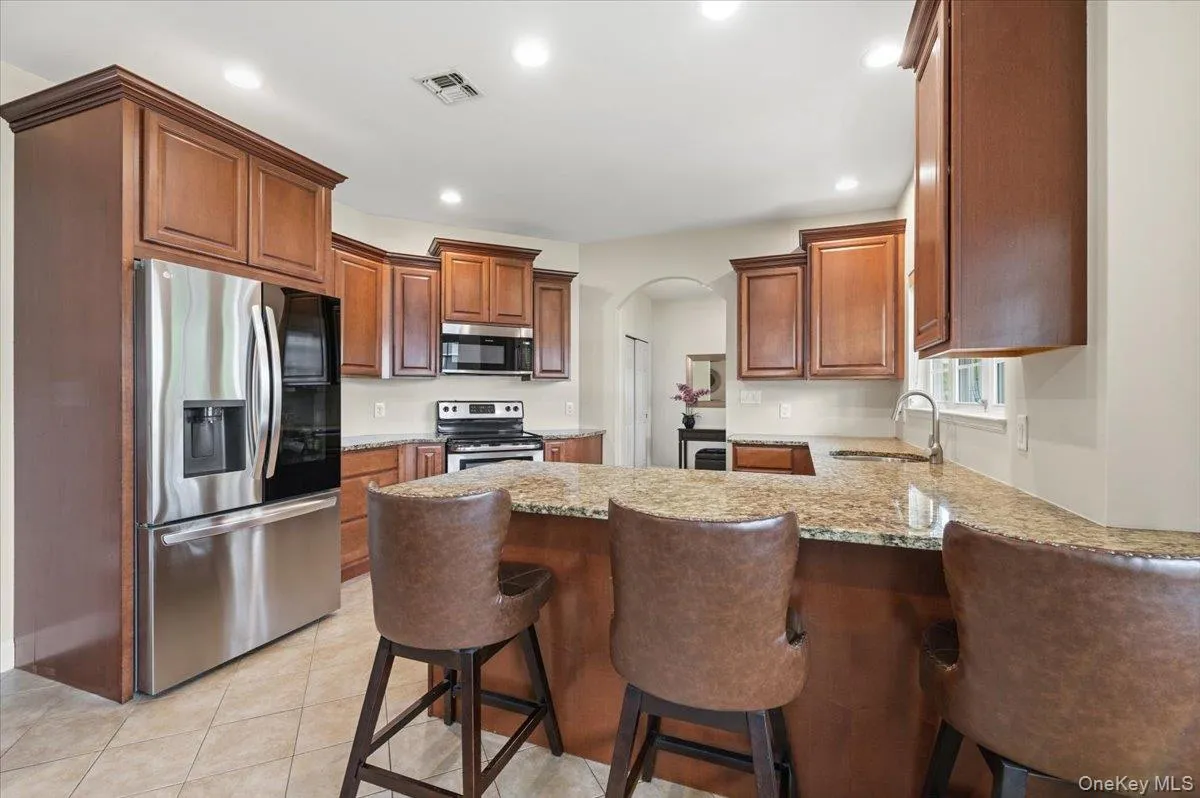 view of kitchen, electric stove view of kitchen, electric stove