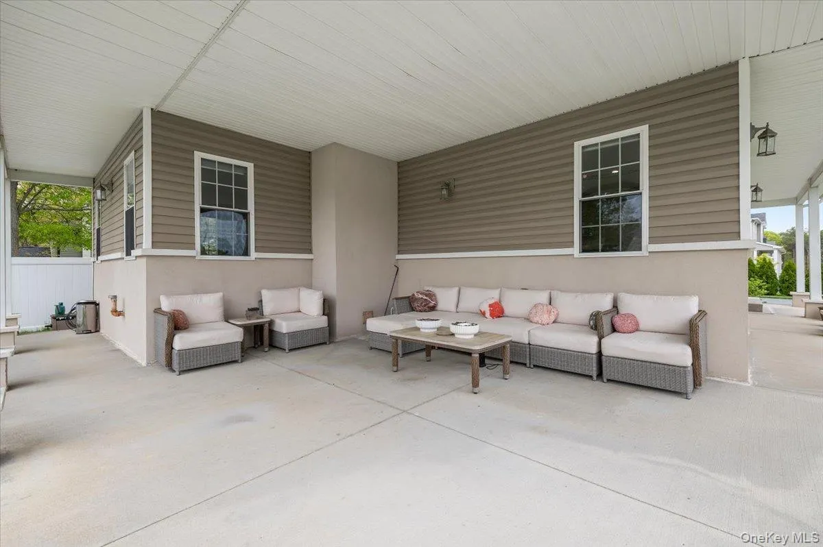 Covered patio on the side of the house.Virtual staging Covered patio on the side of the house.Virtual staging