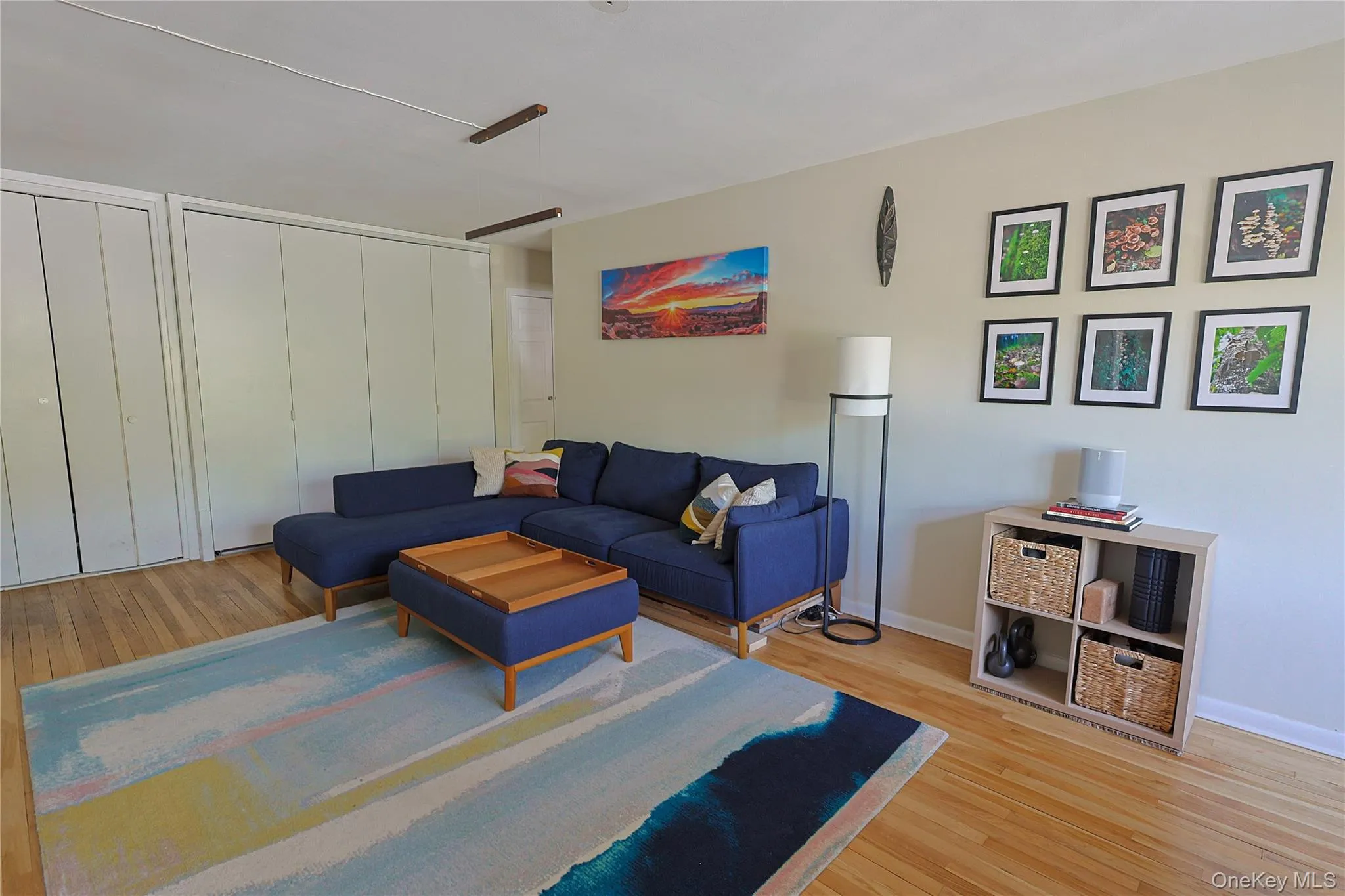 Hardwood flooring with neutral wall paint and white baseboards Hardwood flooring with neutral wall paint and white baseboards