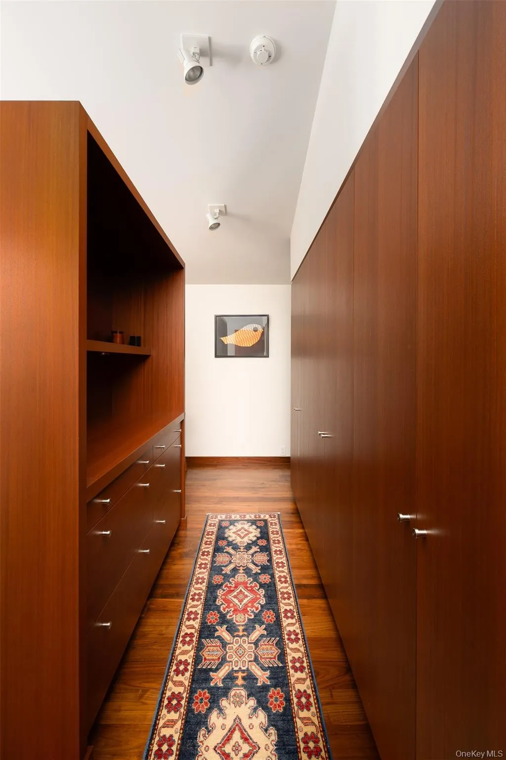 Walk-Through Closet in Primary Bedroom Walk-Through Closet in Primary Bedroom
