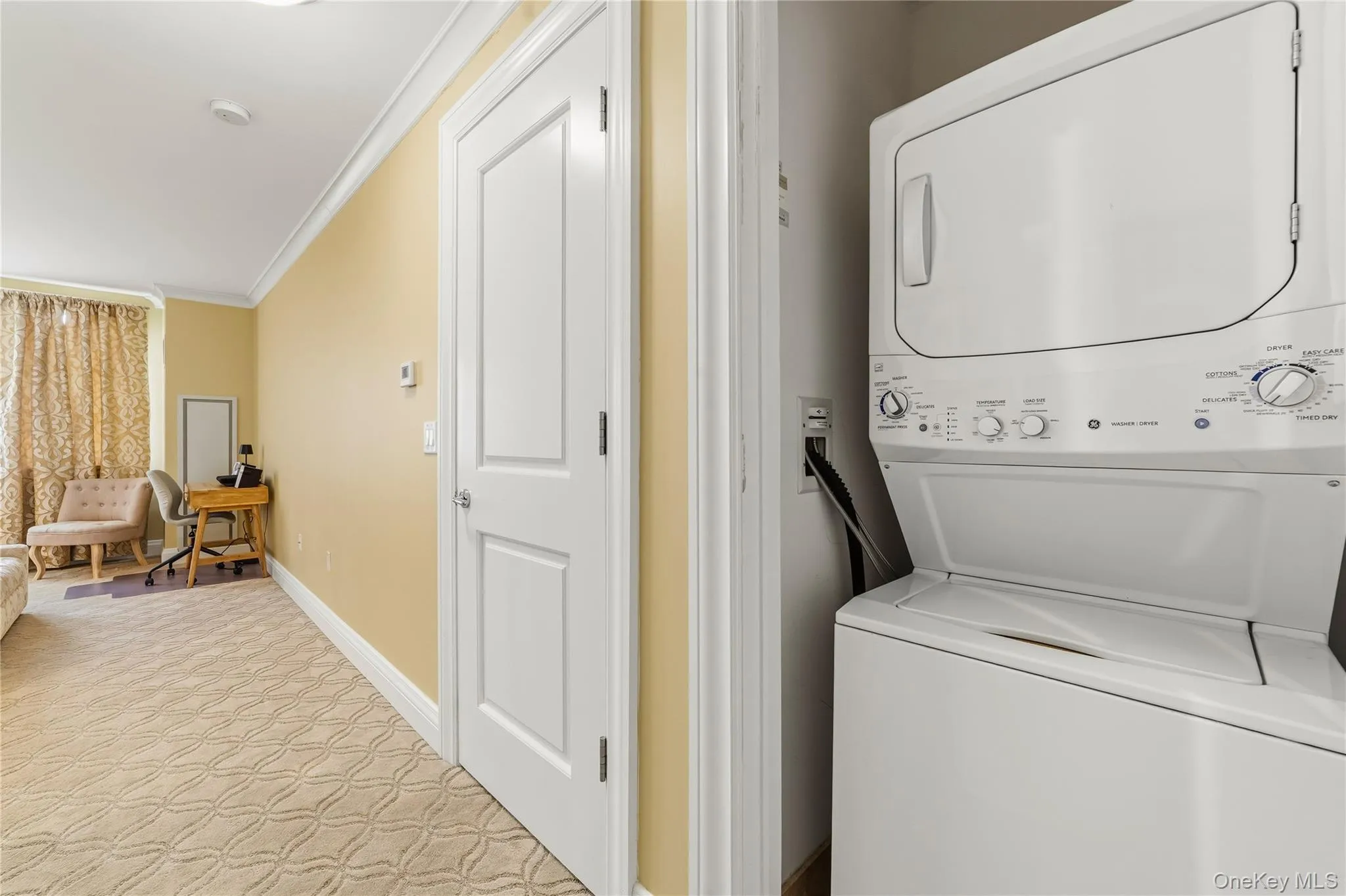 Laundry closet conveniently located outside the bathroom in the hall. Laundry closet conveniently located outside the bathroom in the hall.