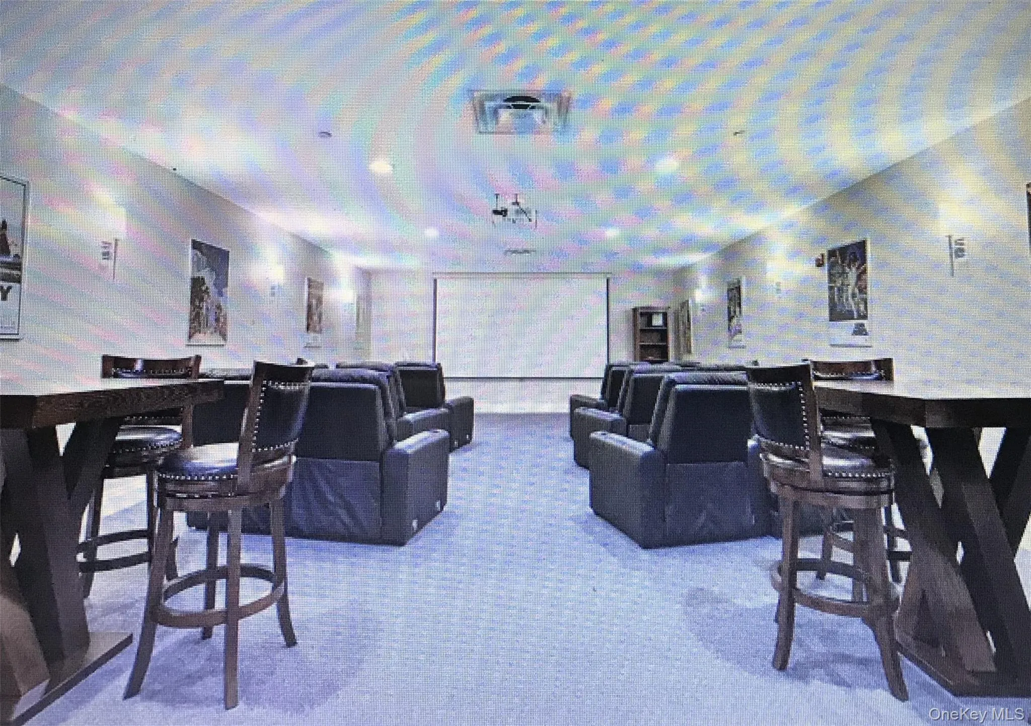 Theater with private screenings, and high top table and chairs, stadium lounge chairs. Theater with private screenings, and high top table and chairs, stadium lounge chairs.
