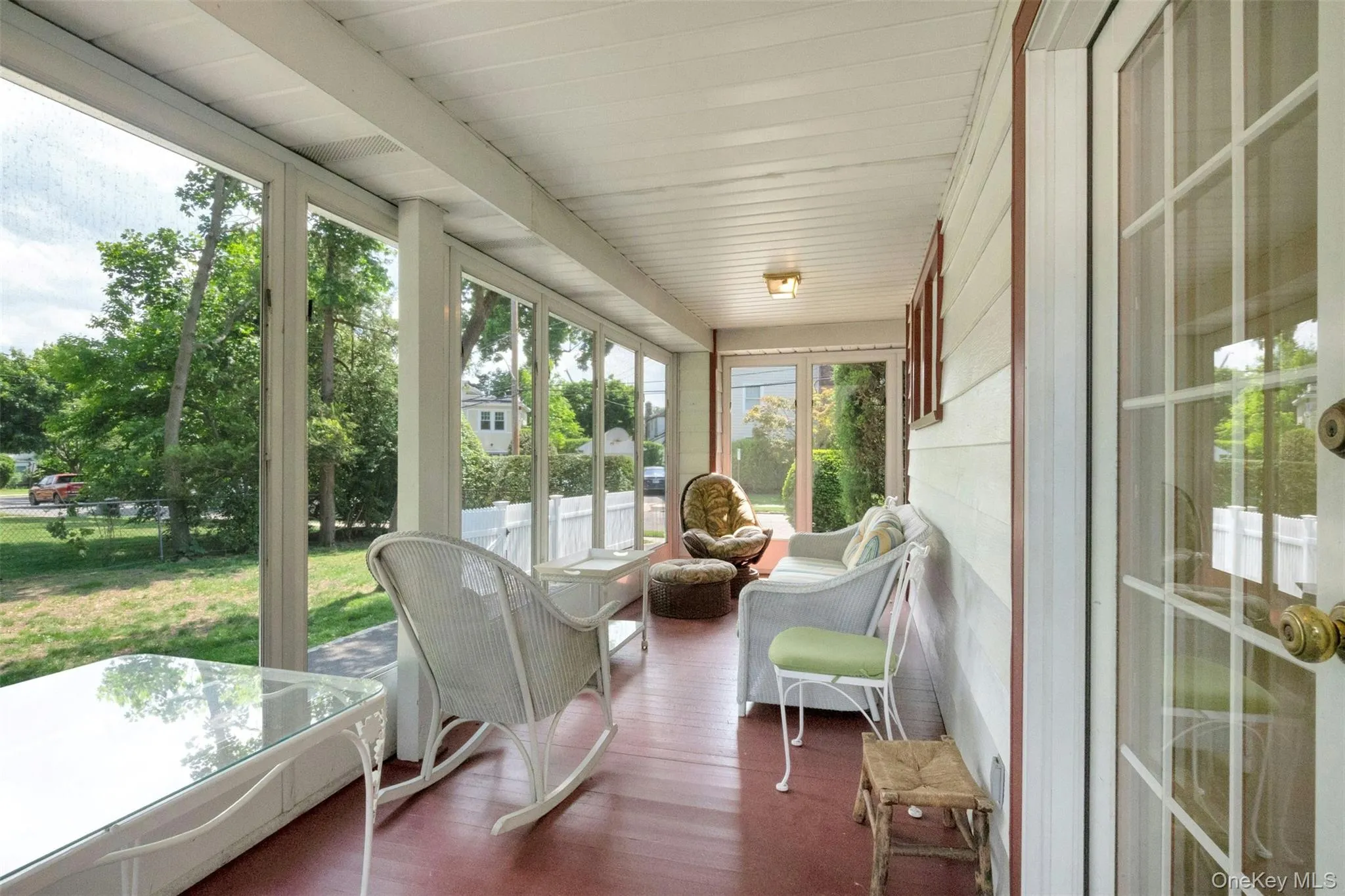 Large screened porch off of kitchen Large screened porch off of kitchen