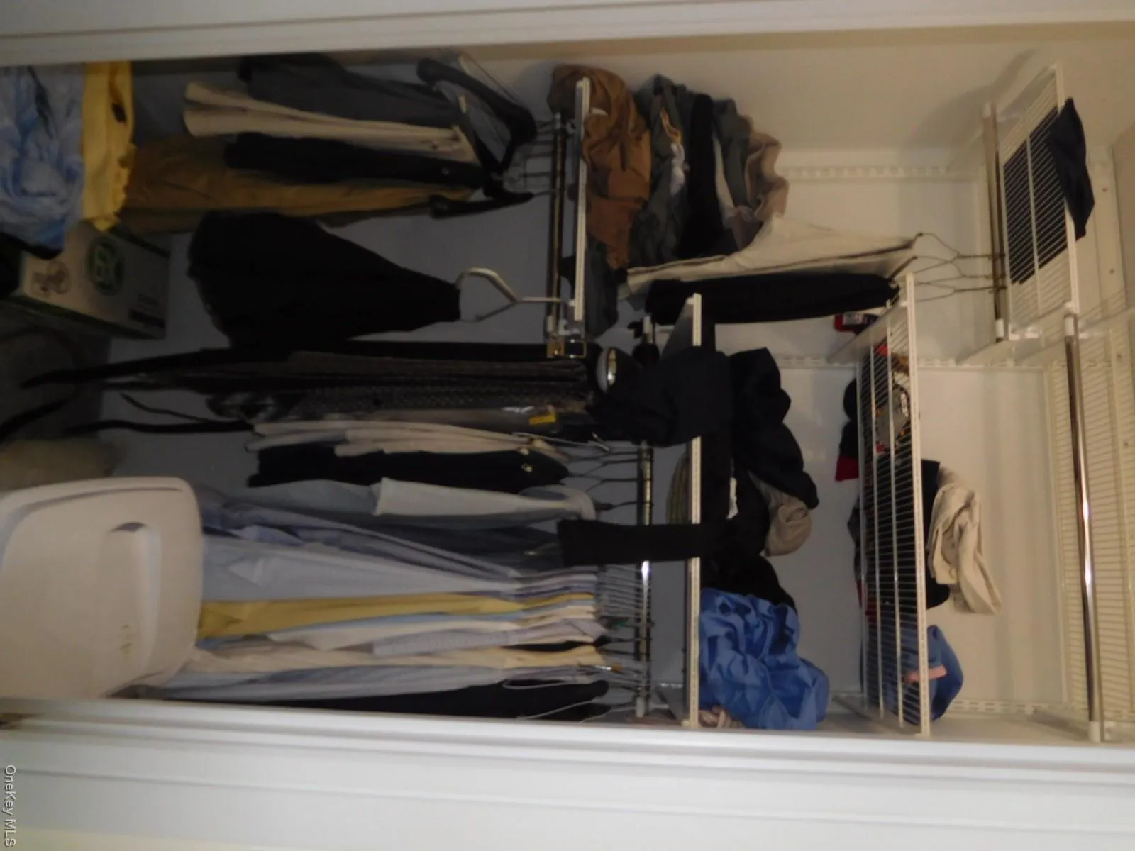 Primary Bedroom walk in closet Primary Bedroom walk in closet