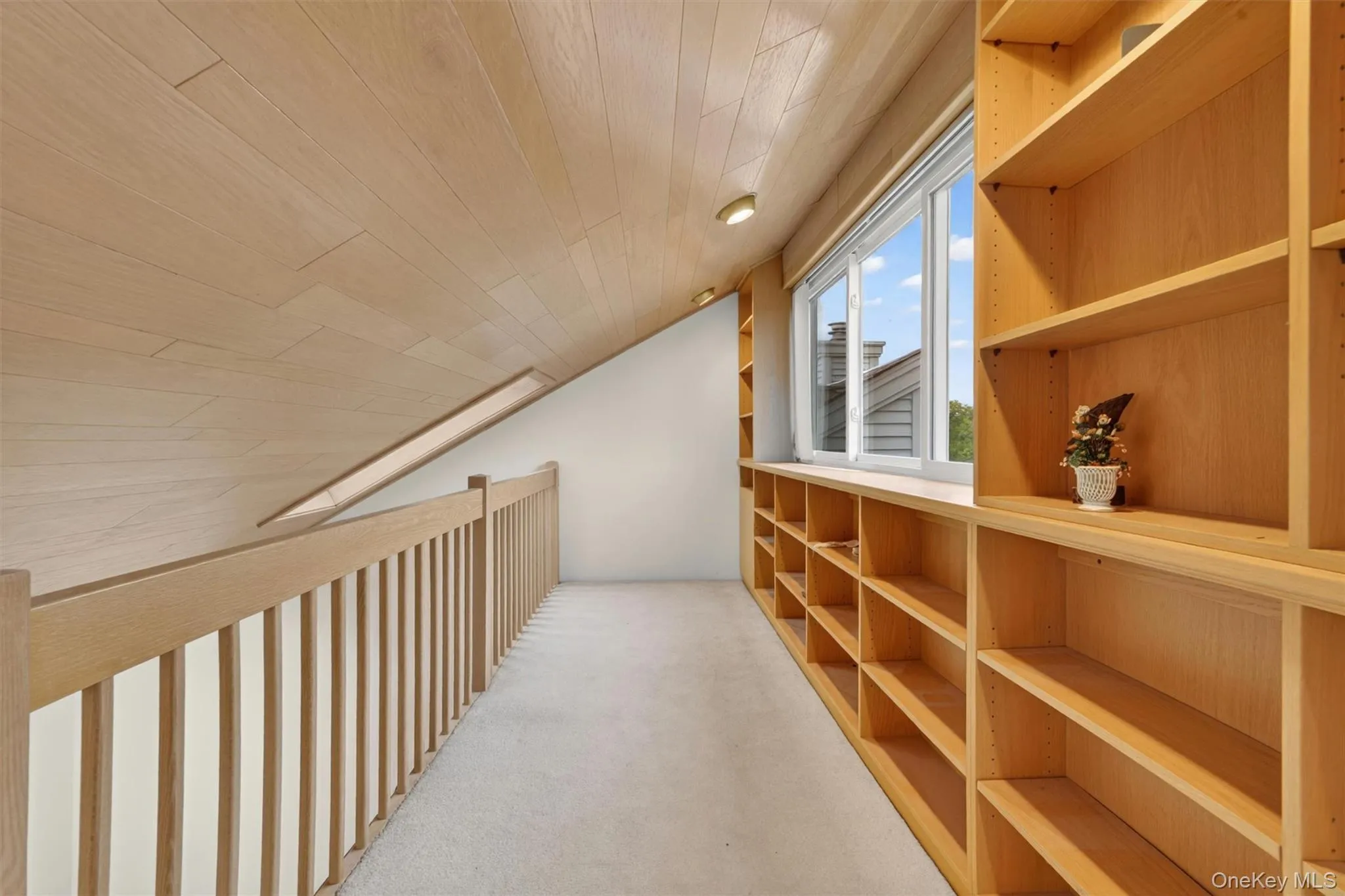 4th level open room with storage built-ins 4th level open room with storage built-ins