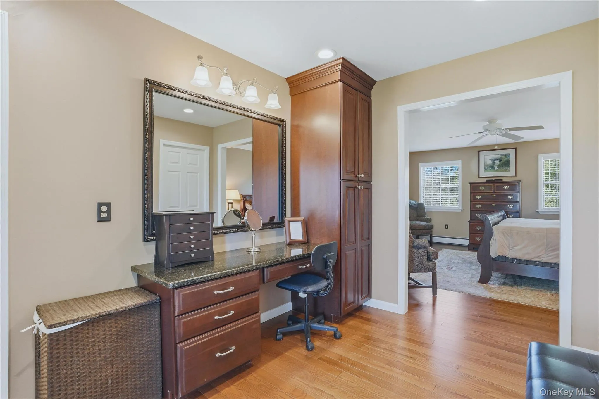 Vanity area with cabinetry Vanity area with cabinetry