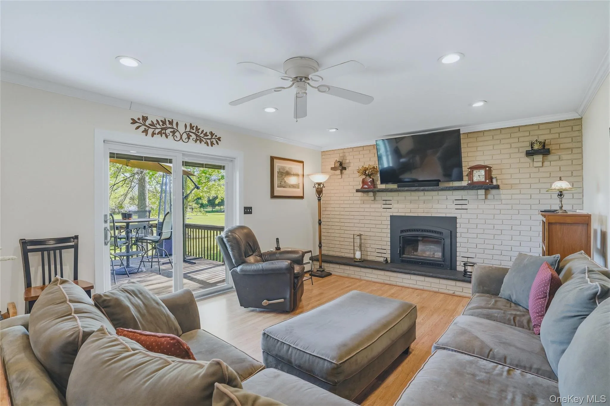 Spacious family room with upgraded wood-burning fireplace Spacious family room with upgraded wood-burning fireplace