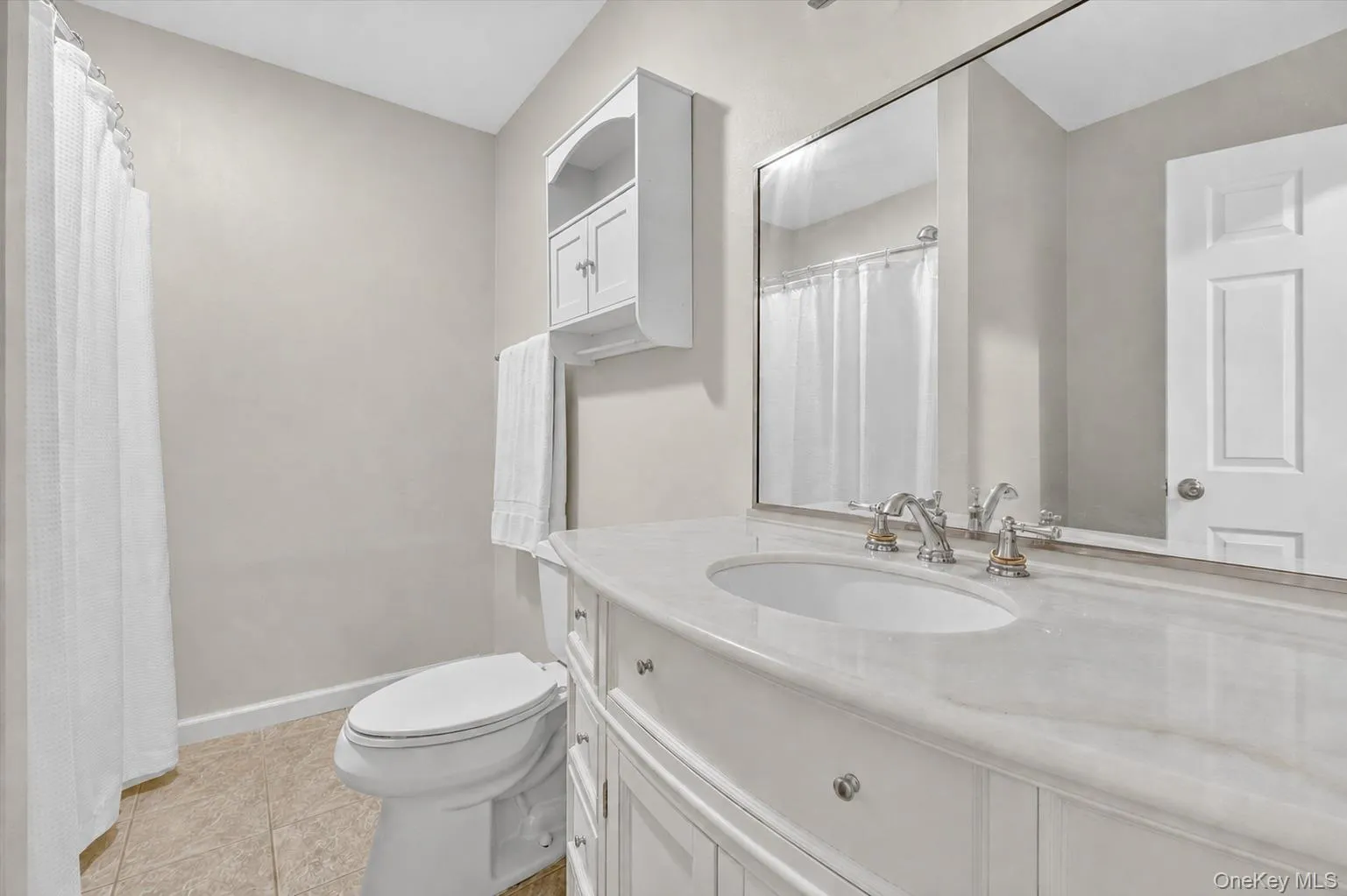 Bathroom counters virtually decluttered for presentation purposes Bathroom counters virtually decluttered for presentation purposes