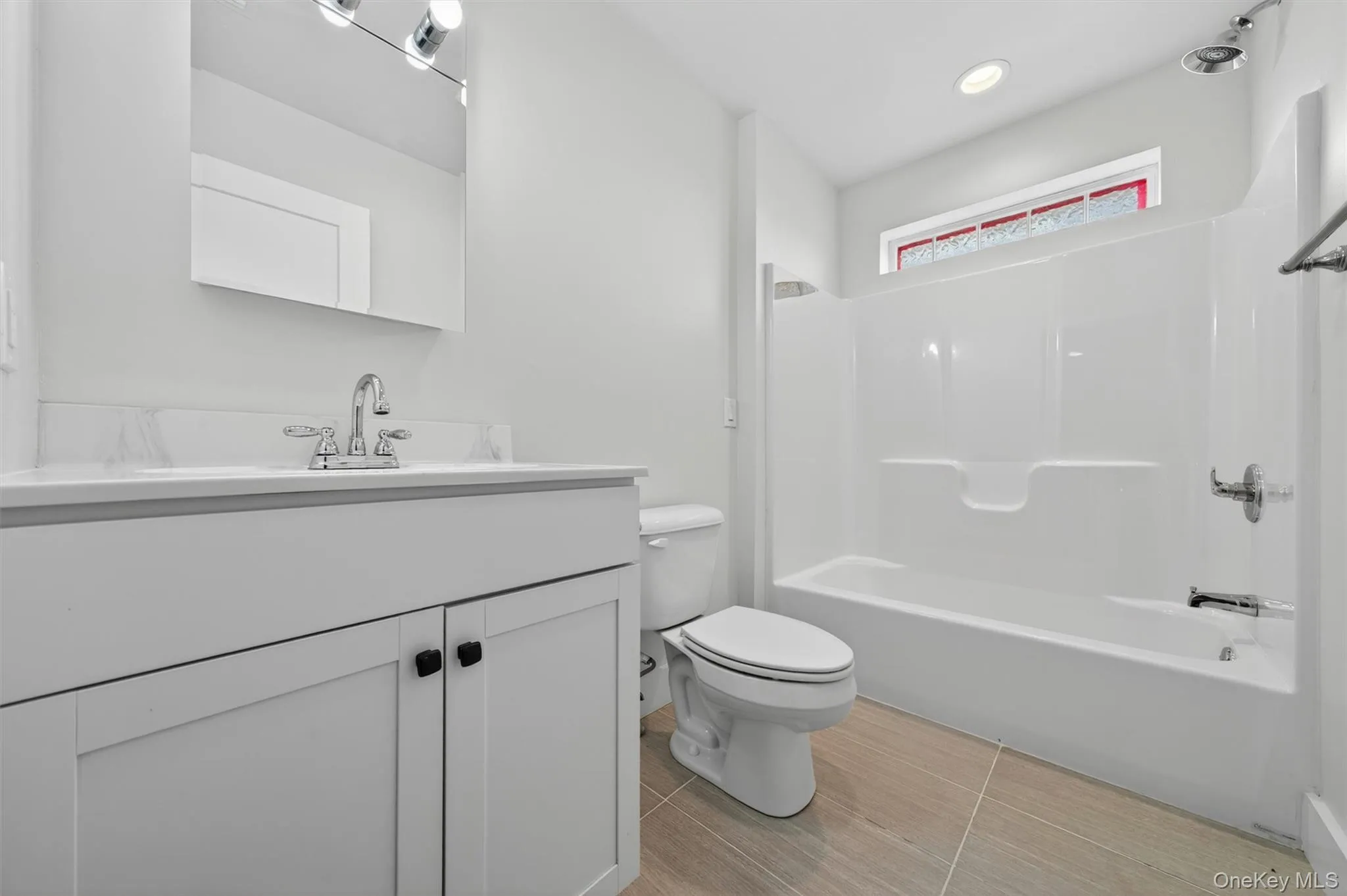 2nd floor full bathroom with a tub. 2nd floor full bathroom with a tub.