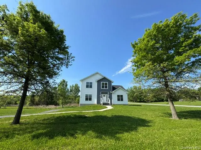 View of the front of the house from the road. View of the front of the house from the road.