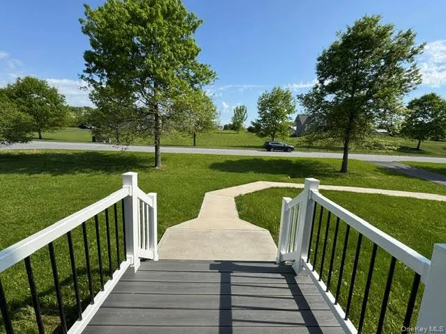 View of the front yard from the front walkway. View of the front yard from the front walkway.